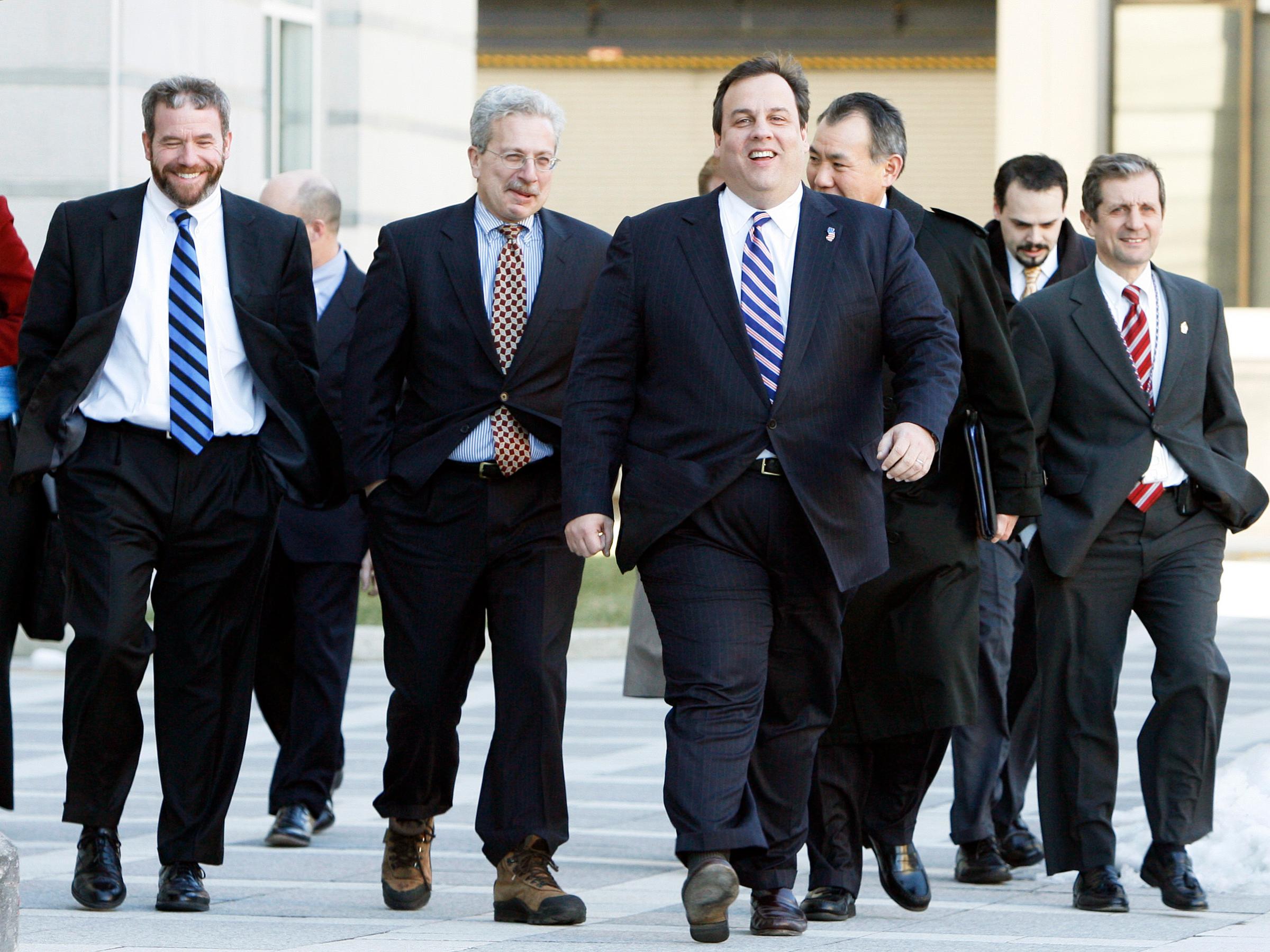 Then-U.S. Attorney Chris Christie heads to a news conference following the indictment of N.J. Senator Joseph Coniglio in Newark, N.J. on Feb. 14, 2008.
