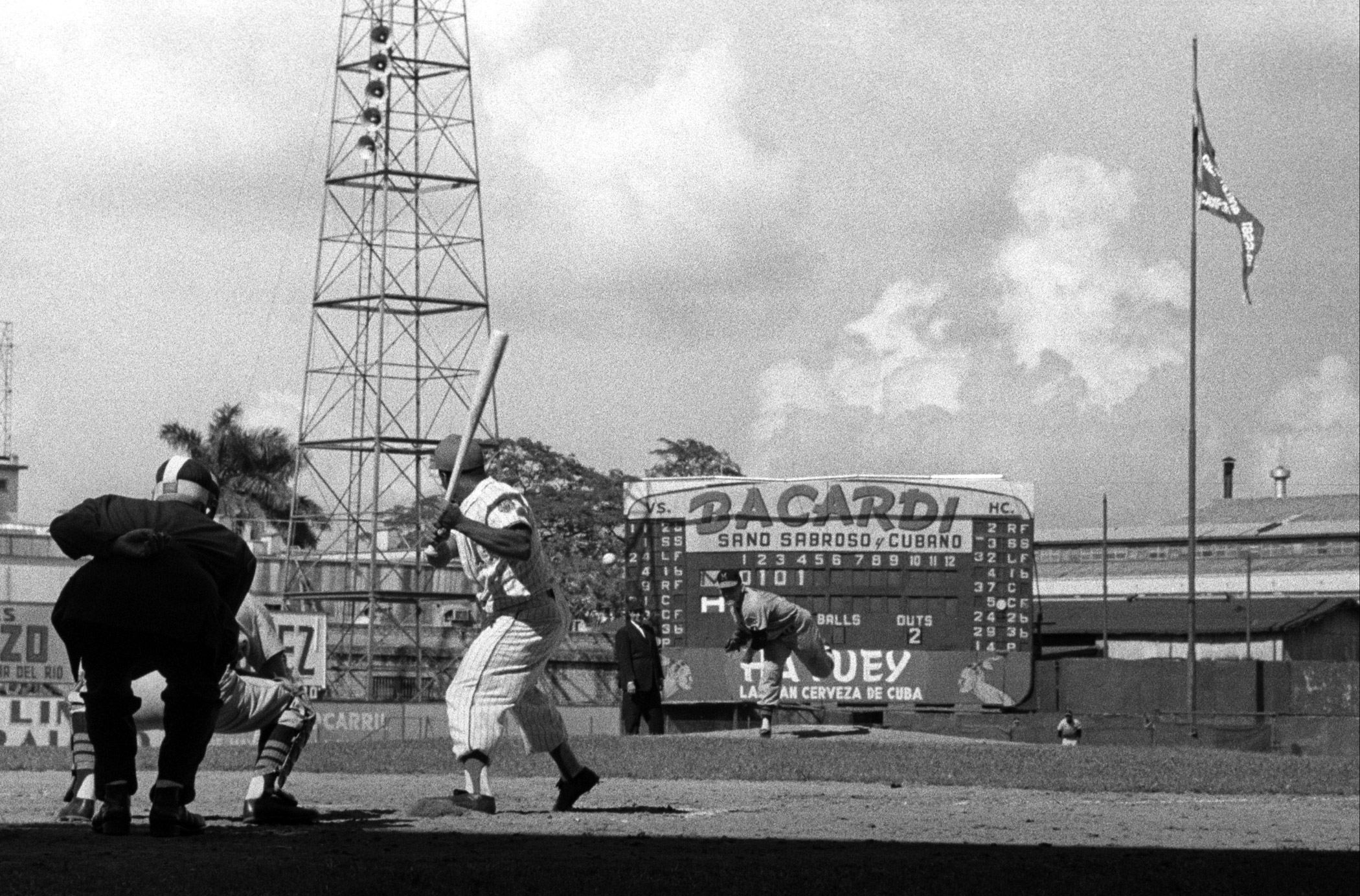 Baseball players in action during the first baseball championship in Havana in 1960.