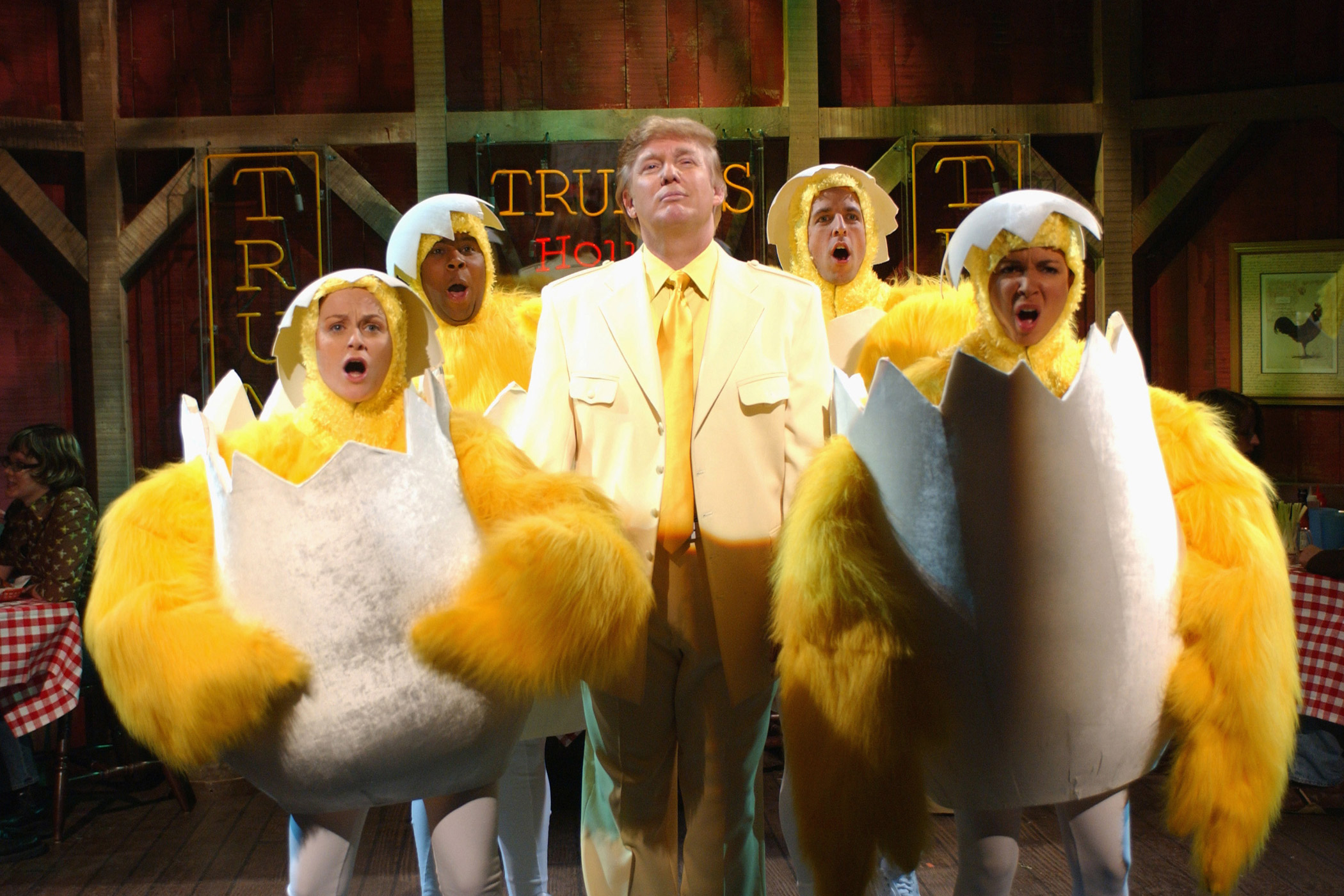 Donald Trump hosted 'Saturday Night Live' on April 3, 2004. He appeared in the 'Donald Trump's House of Wings' sketch with Amy Poehler, Kenan Thompson, Seth Meyers and Maya Rudolph.