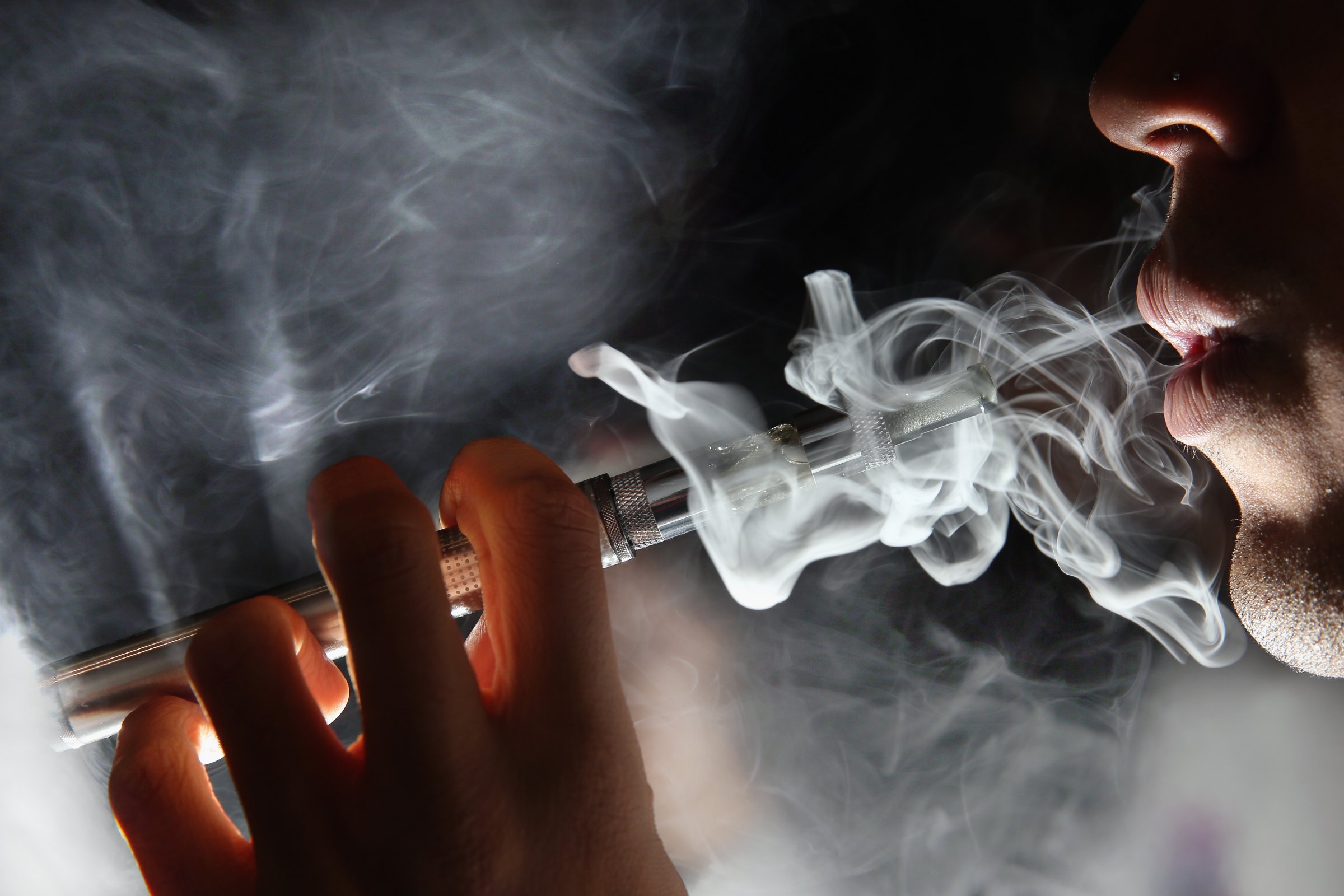 A man smokes an E-Cigarette on Aug. 27, 2014 in London.