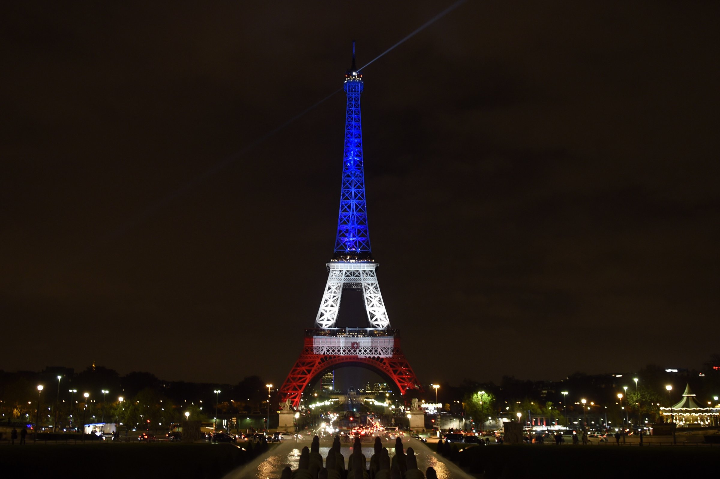 A view of the Eiffel Tower illuminated with the colors of the French flag in tribute to the victims of the attacks in Paris on Nov. 13, 2015.