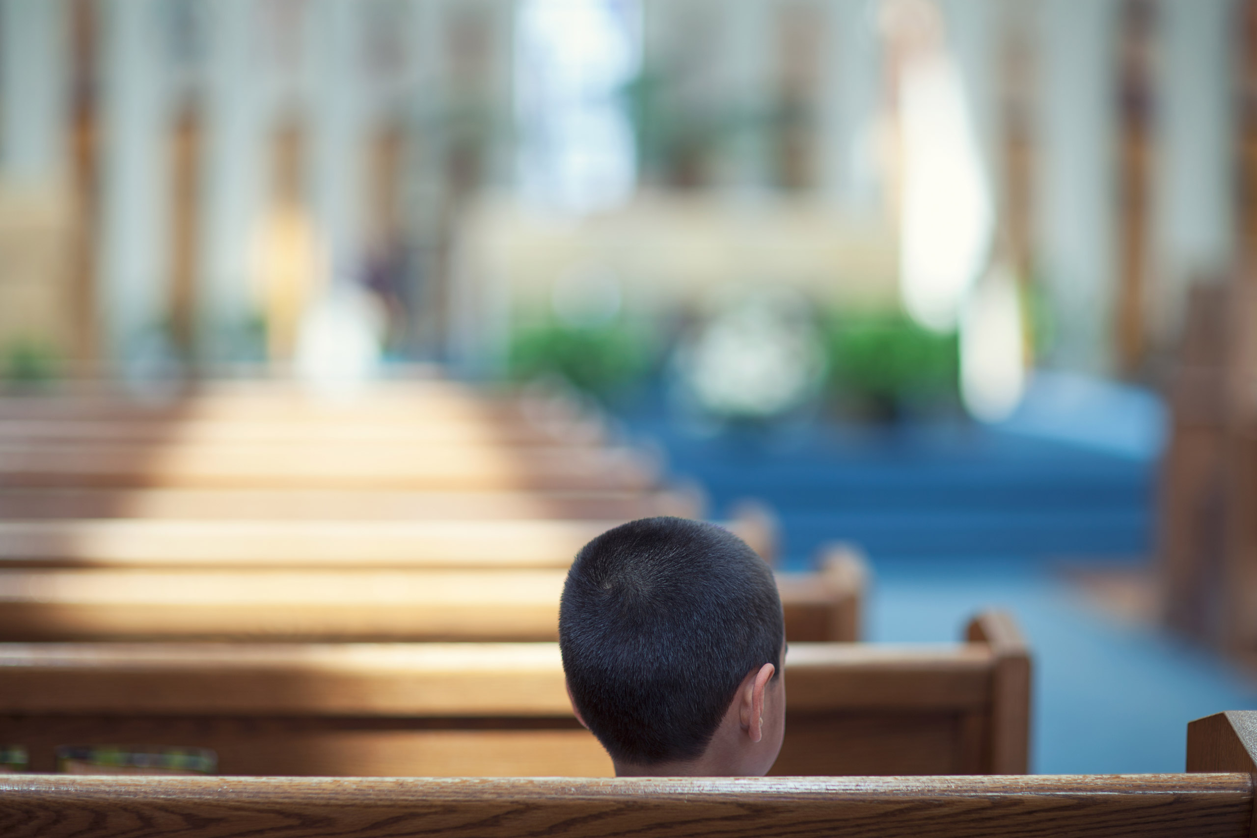 child sitting alone in church Allen Donikowski&mdash;Getty Images/Flickr RF