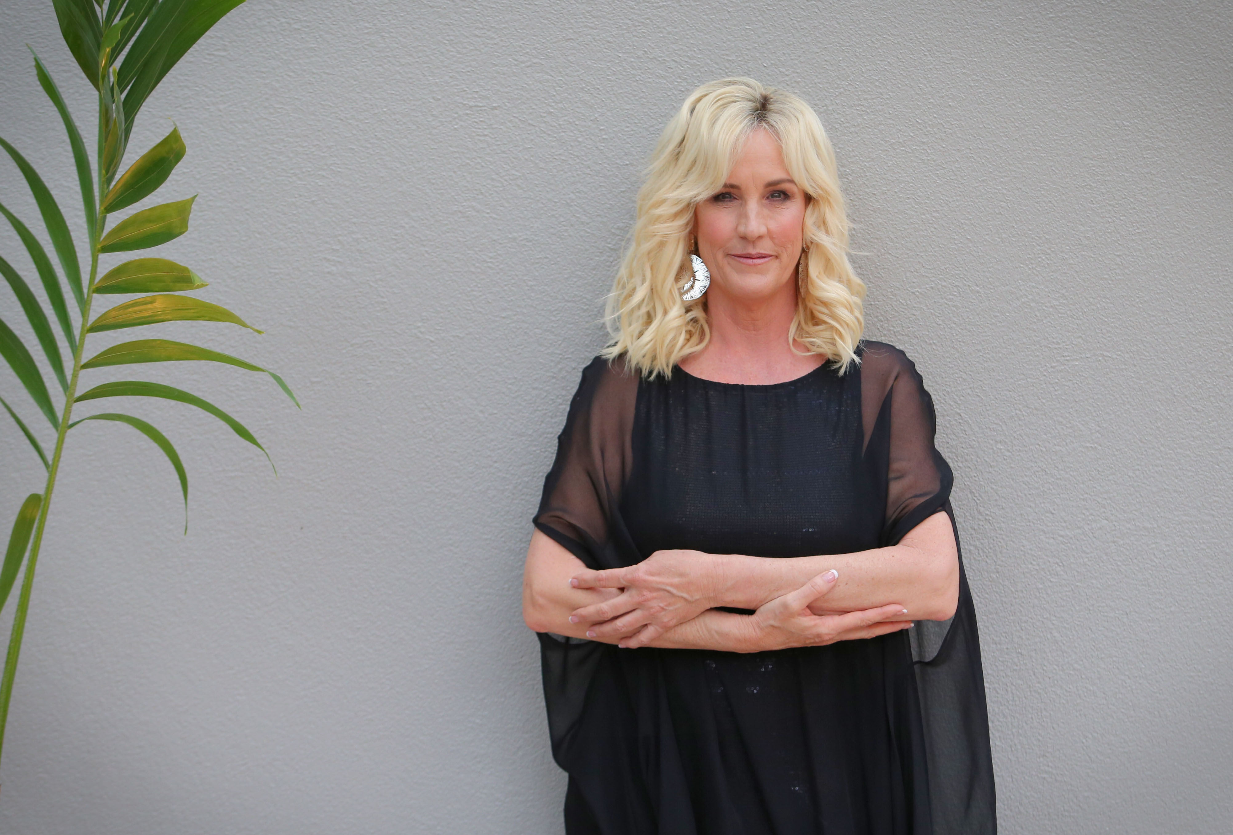 American legal clerk and environmental activist, Erin Brockovich poses during a photo shoot at the Stamford Hotel in Brisbane, Australia, on February 17, 2015.
