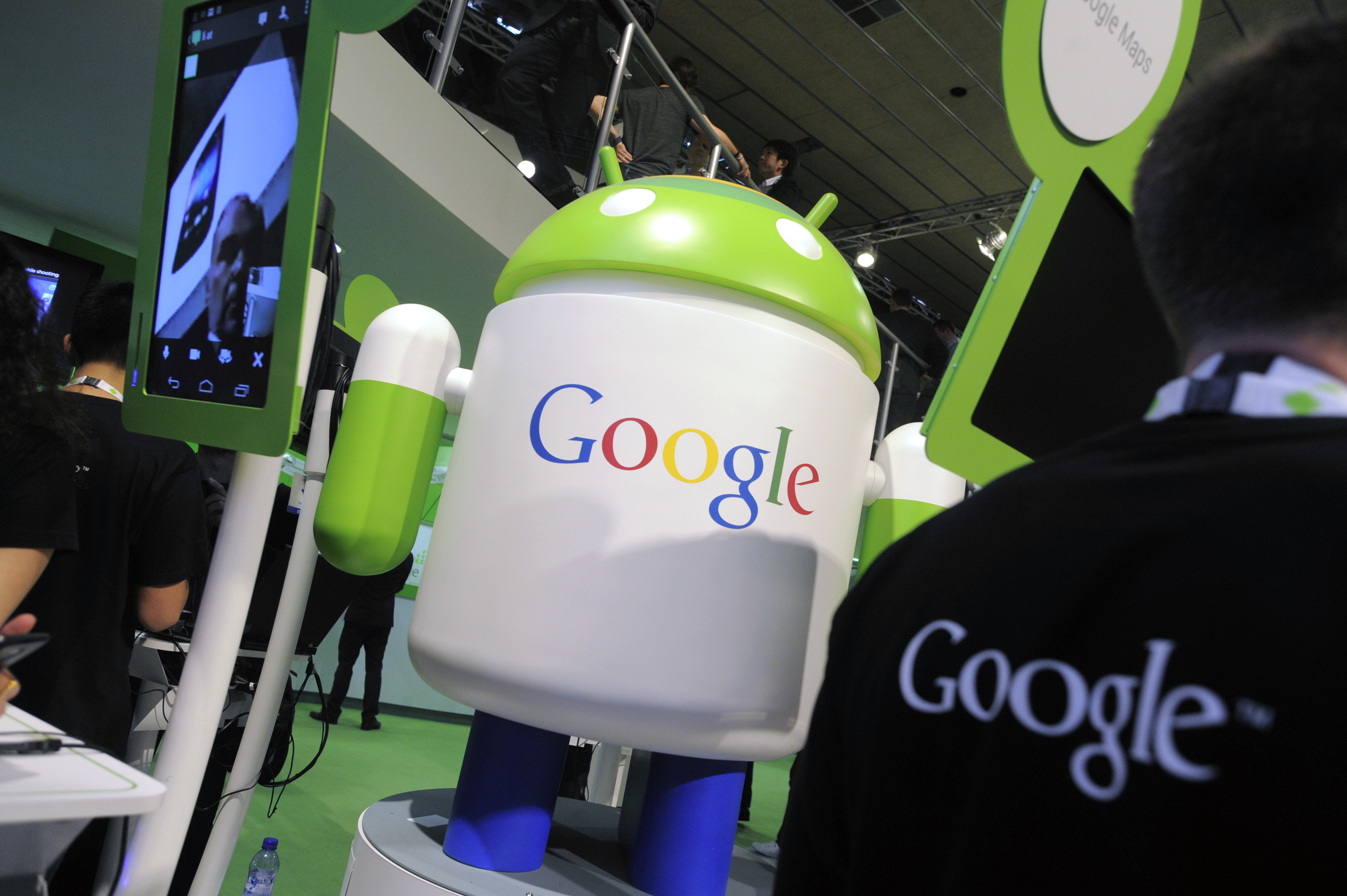 An Android operating software icon sits on display with a Google Inc. logo at the Google booth at the Mobile World Congress in Barcelona, Spain, on Wednesday, Feb. 29, 2012. (Bloomberg /Getty Images)