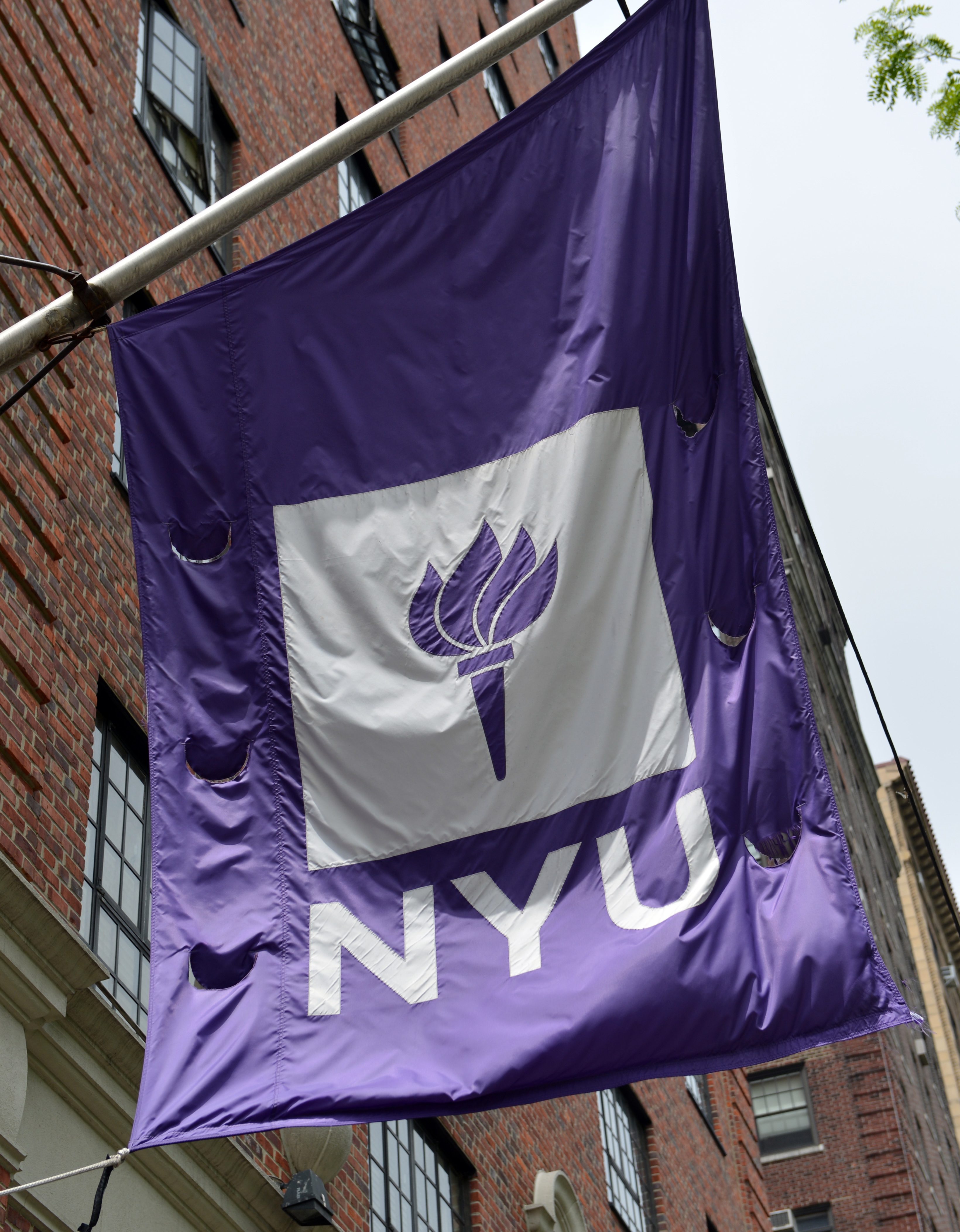 A flag flies from a building at New York