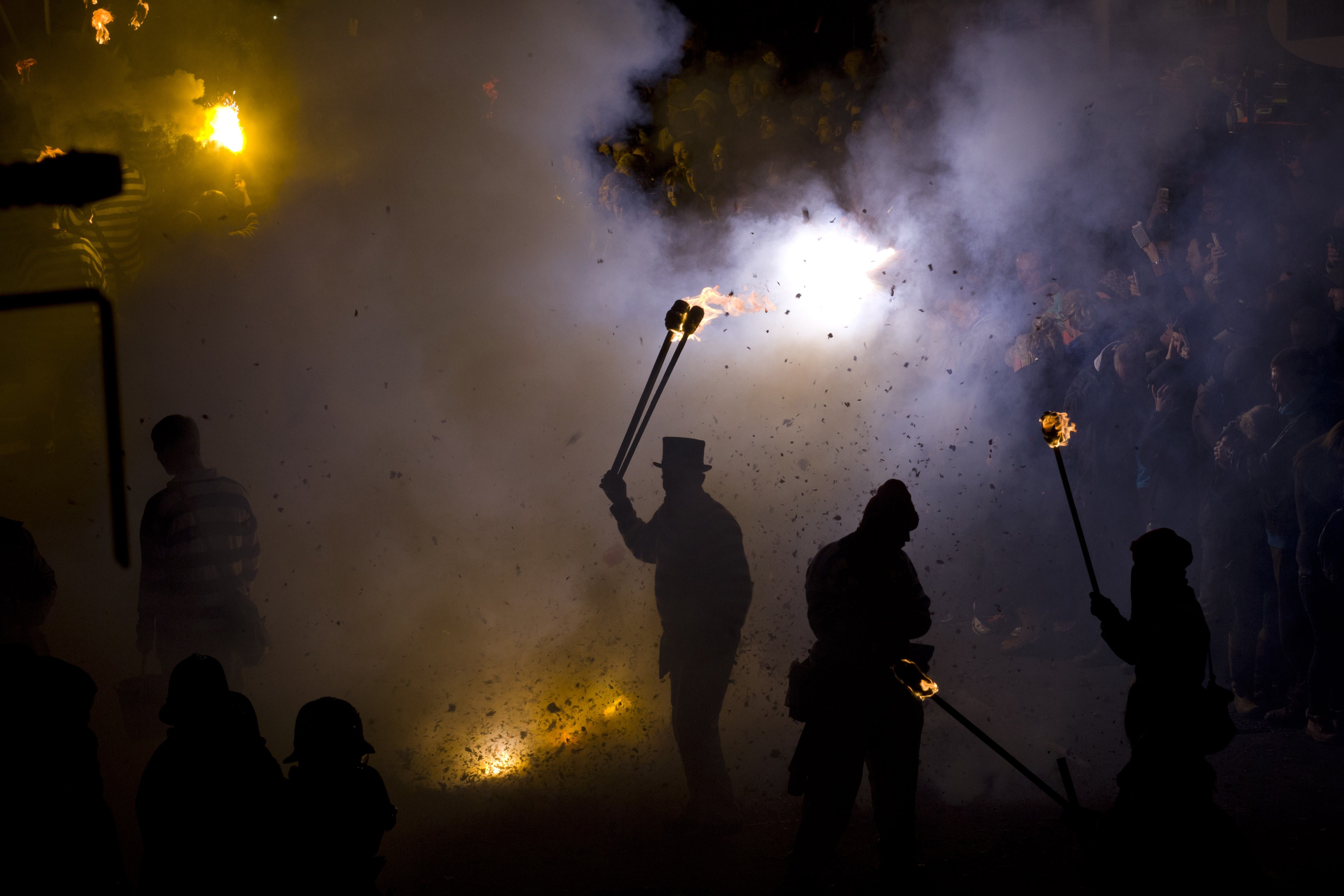 Bonfire societies parade through the streets of Lewes in Sussex, during the traditional Bonfire Night celebrations on Nov. 5, 2014. (Justin Tallis—AFP/Getty Images)