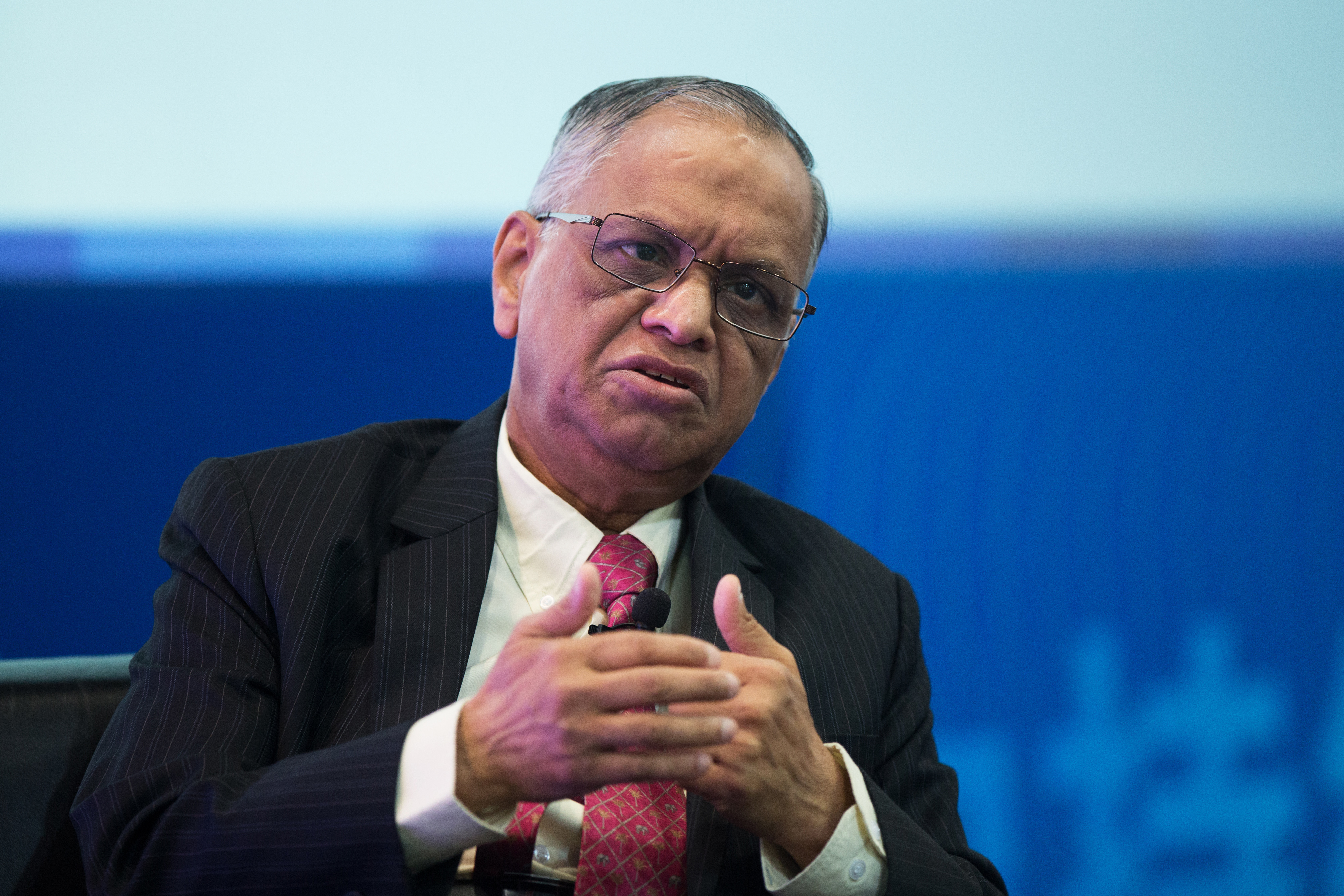 N.R. Narayana Murthy, co-founder and chairman of Infosys, gestures as he speaks during the Hong Kong Asian Financial Forum in Hong Kong on Jan. 19, 2015 (Jerome Favre—Bloomberg/Getty Images)