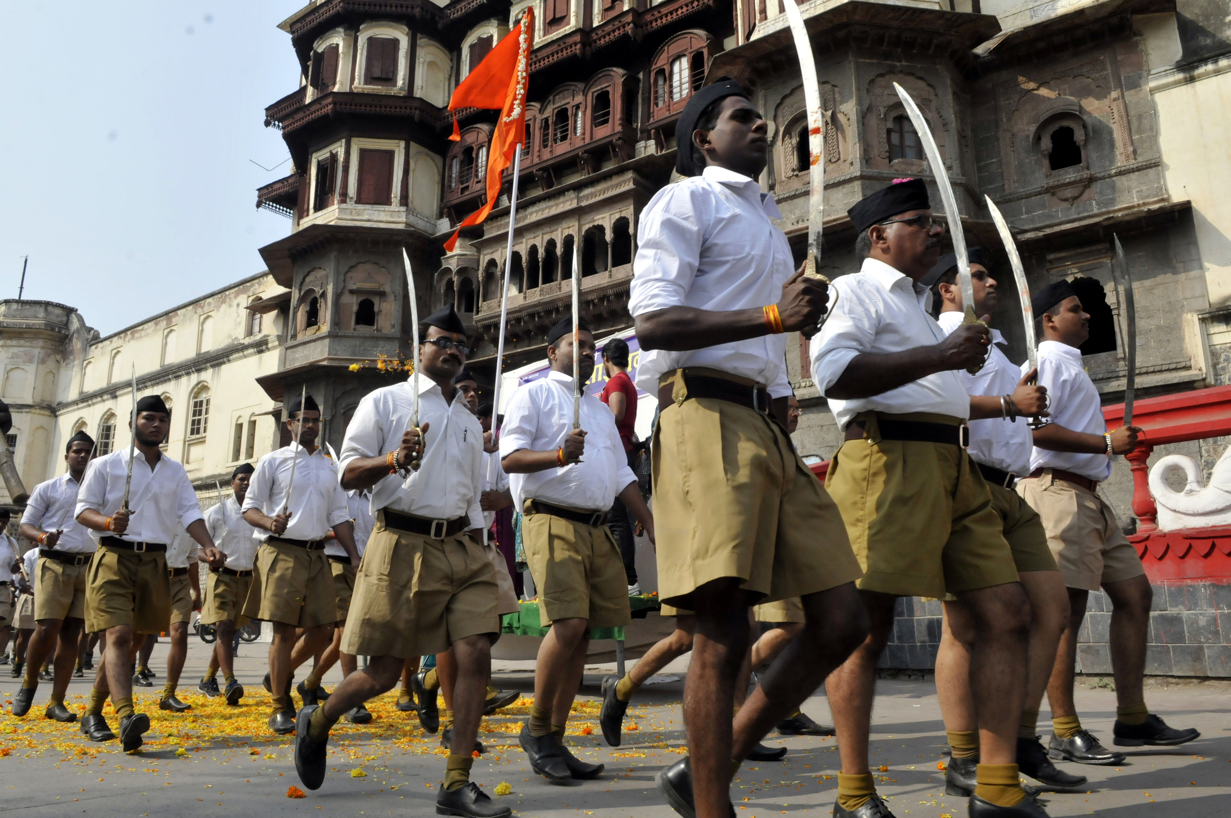RSS volunteers queue up for an annual march at Jehangirabad area in Indore, India, on Oct. 22, 2015 (Arun Mondhe—HIndustan Times/Getty Images)