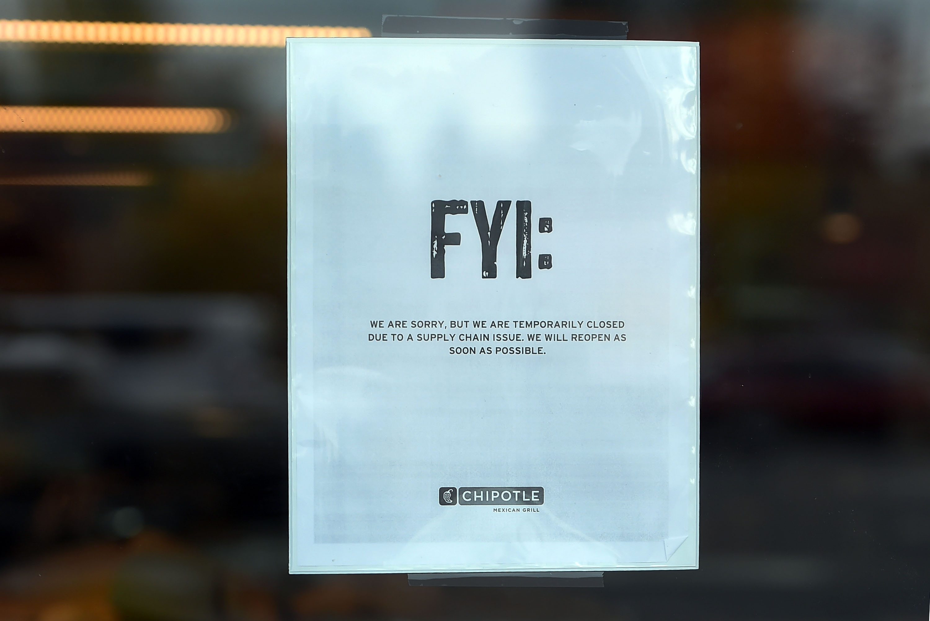 A sign hangs on the door of a Chipotle Mexican Grill store location in on November 3, 2015 in Vancouver, Washington.  Chipotle Mexican Grill is temporarily closing more than 40 restaurants in and around Washignton and Oregon, as health officials investigate an E. coli outbreak. (Steve Dykes&mdash;Getty Images)