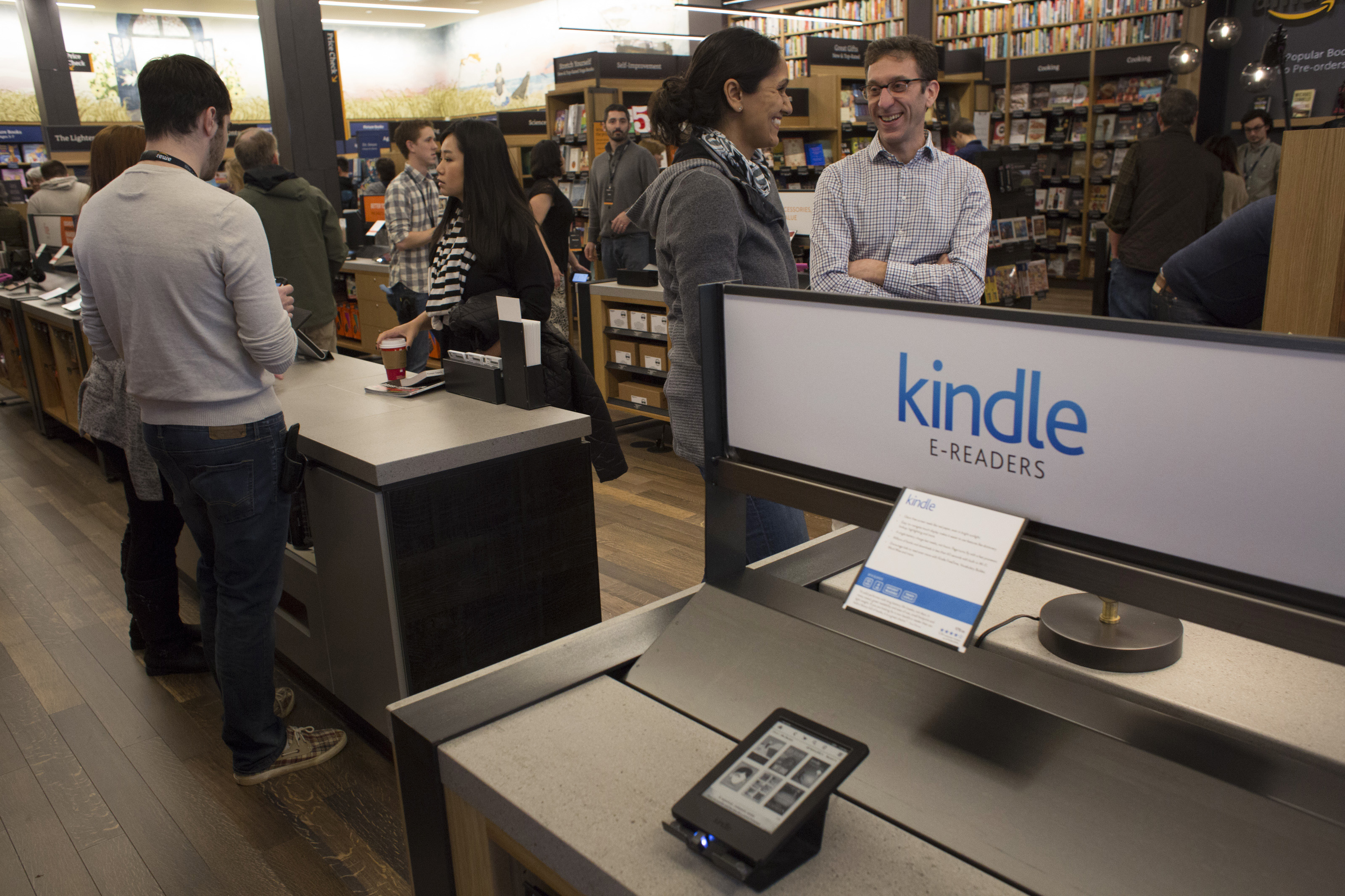 Customers shop at Amazon Books in Seattle, Washington, on Tuesday, Nov. 3, 2015. The online retailer Amazon.com Inc. opened its first brick-and-mortar location in Seattle's upscale University Village mall. Photographer: David Ryder/Bloomberg (David Ryder—© 2015 Bloomberg Finance LP)