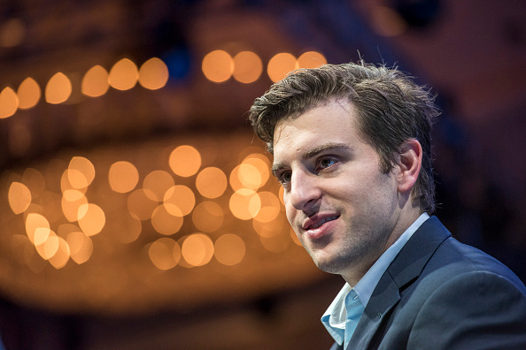 Brian Chesky, co-founder and chief executive officer of Airbnb Inc., listens during the 2015 Fortune Global Forum in San Francisco, California, U.S., on Wednesday, Nov. 4, 2015 (David Paul Morris—Bloomberg/Getty Images)