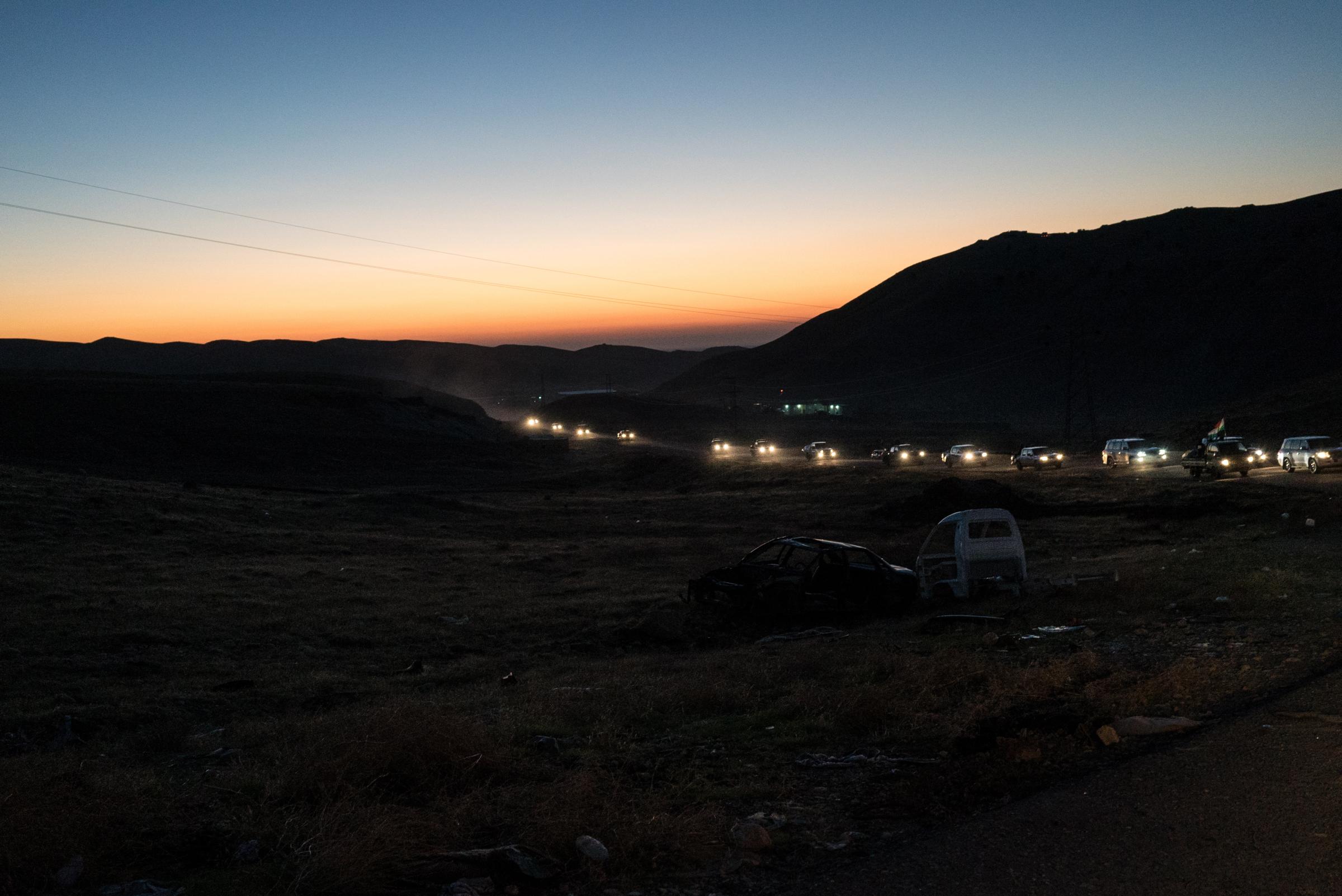 MT. SINJAR, NOVEMBER 12: A convoy of peshmerga forces drives to