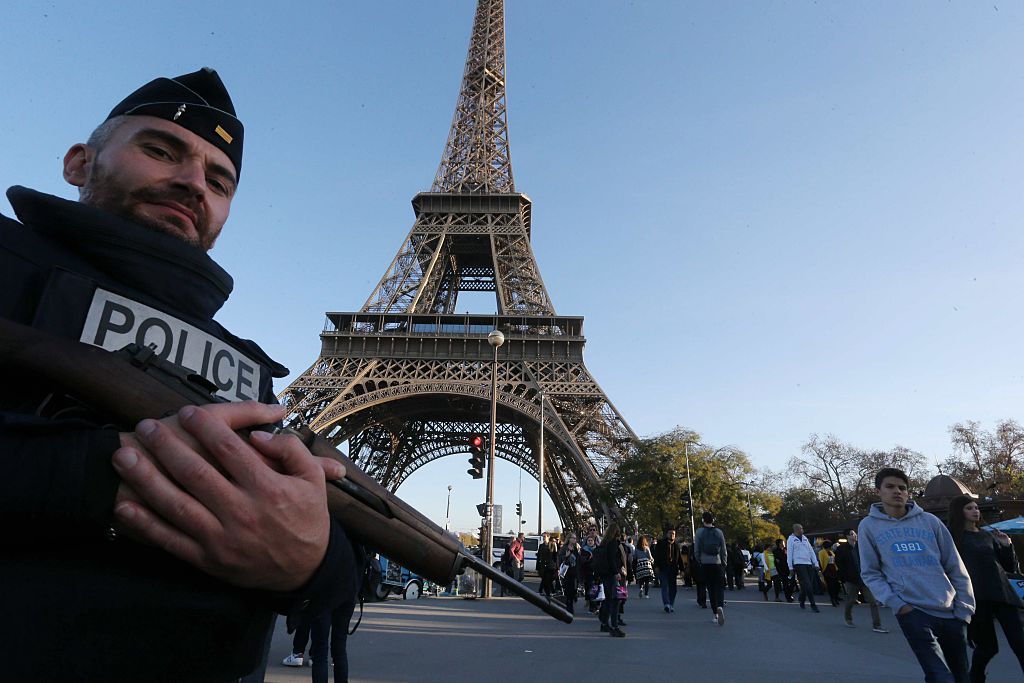 The Eiffel tower is closed and guarded by police following Friday's terrorist attacks in Paris. (Xavier Laine / Getty Images)