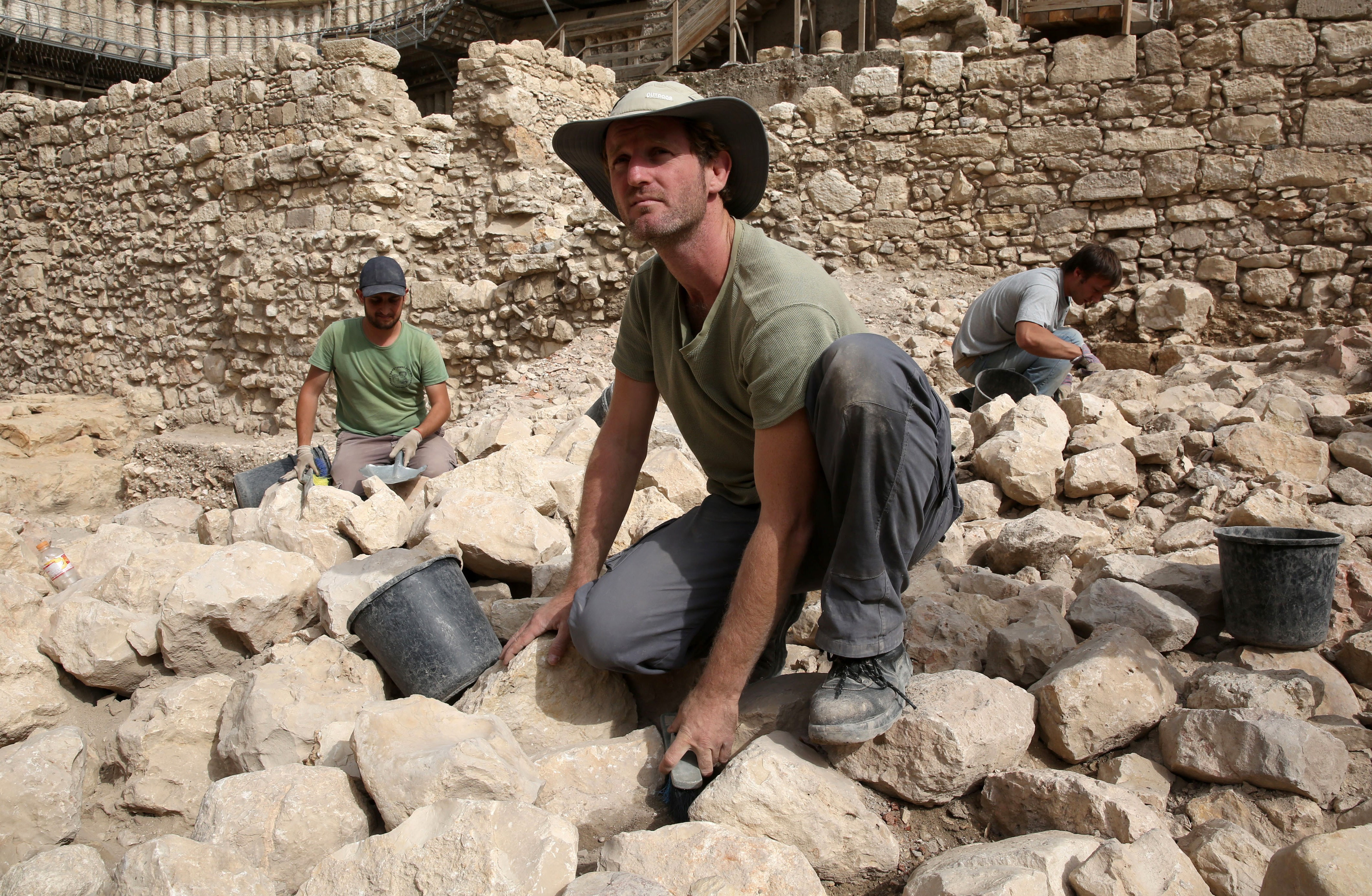 Workers from the Israeli Antiquity Authorities dig on November 3, 2015 at the excavation site near the City of David adjacent to Jerusalem's Old City walls where researchers believe to have found the remains of the stronghold the Acra (Gali Tibbon—AFP/Getty Images)
