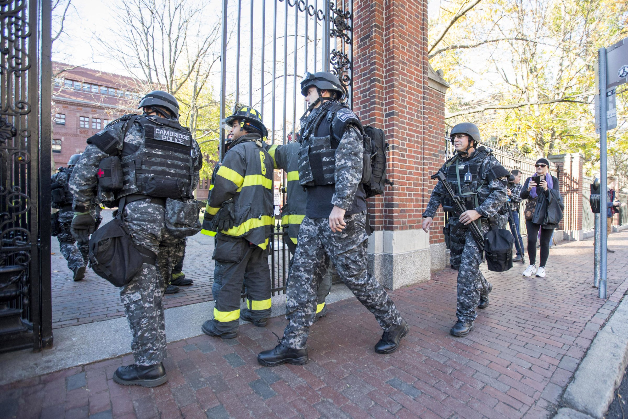 CAMBRIDGE, MA - NOVEMBER 16: Cambridge Police SWAT team members arrive at Harvard Yard following a bomb threat that was made on campus on November 16, 2015 in Cambridge, Massachusetts. Multiple buildings were evacuated and the Harvard Yard was shut down so that authorities could search. (Photo by Scott Eisen/Getty Images)