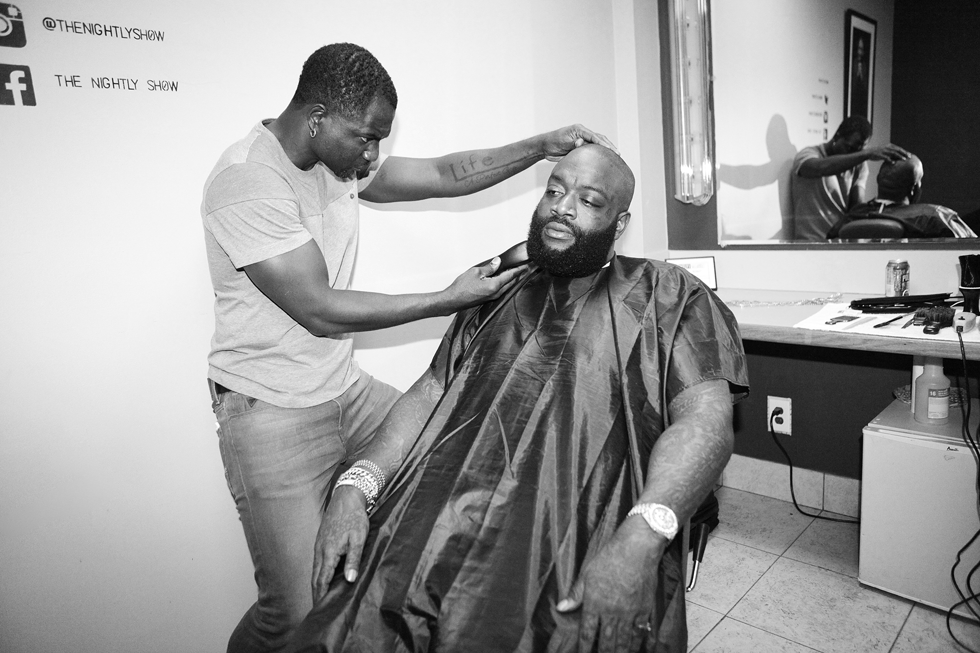 From left: Barber Peter Graham and Rick Ross backstage at The Nightly Show with Larry Wilmore on Nov. 12, 2015 in New York City.
