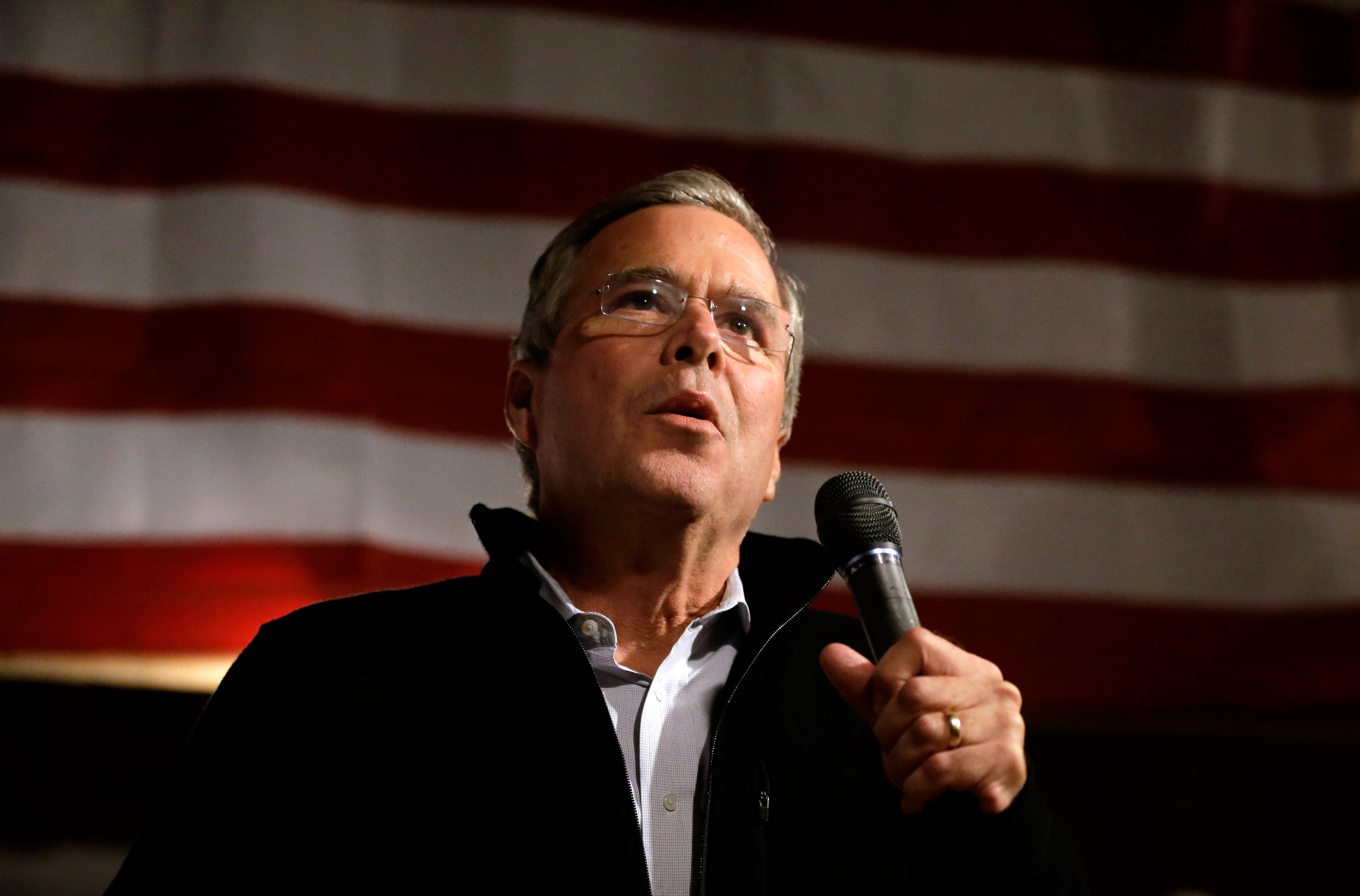 Republican presidential candidate, former Florida Gov. Jeb Bush, addresses an audience at a campaign event held in a barn belonging to former Sen. Scott Brown, R-Mass., Tuesday, Nov. 3, 2015, in Rye, N.H. (AP Photo/Steven Senne)