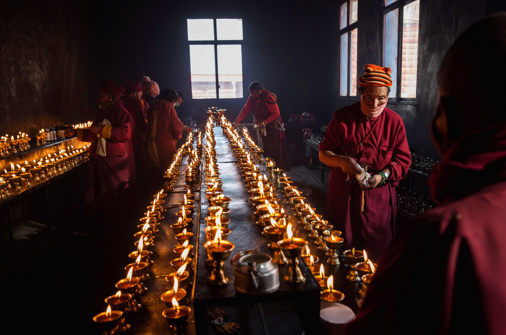 Butter lamps are prepared during the annual Bliss Dharma Assembly at the Larung Wuming Buddhist Institute on Oct. 31.