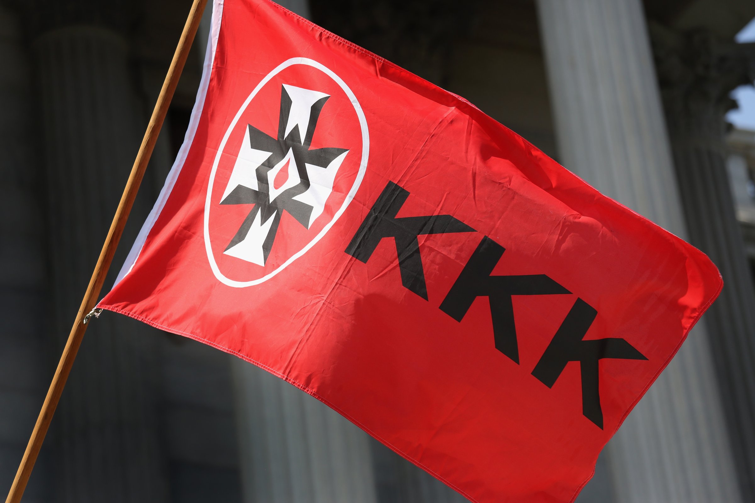 A Ku Klux Klan flag flies during a demonstration at the state house building on July 18, 2015 in Columbia, S.C.