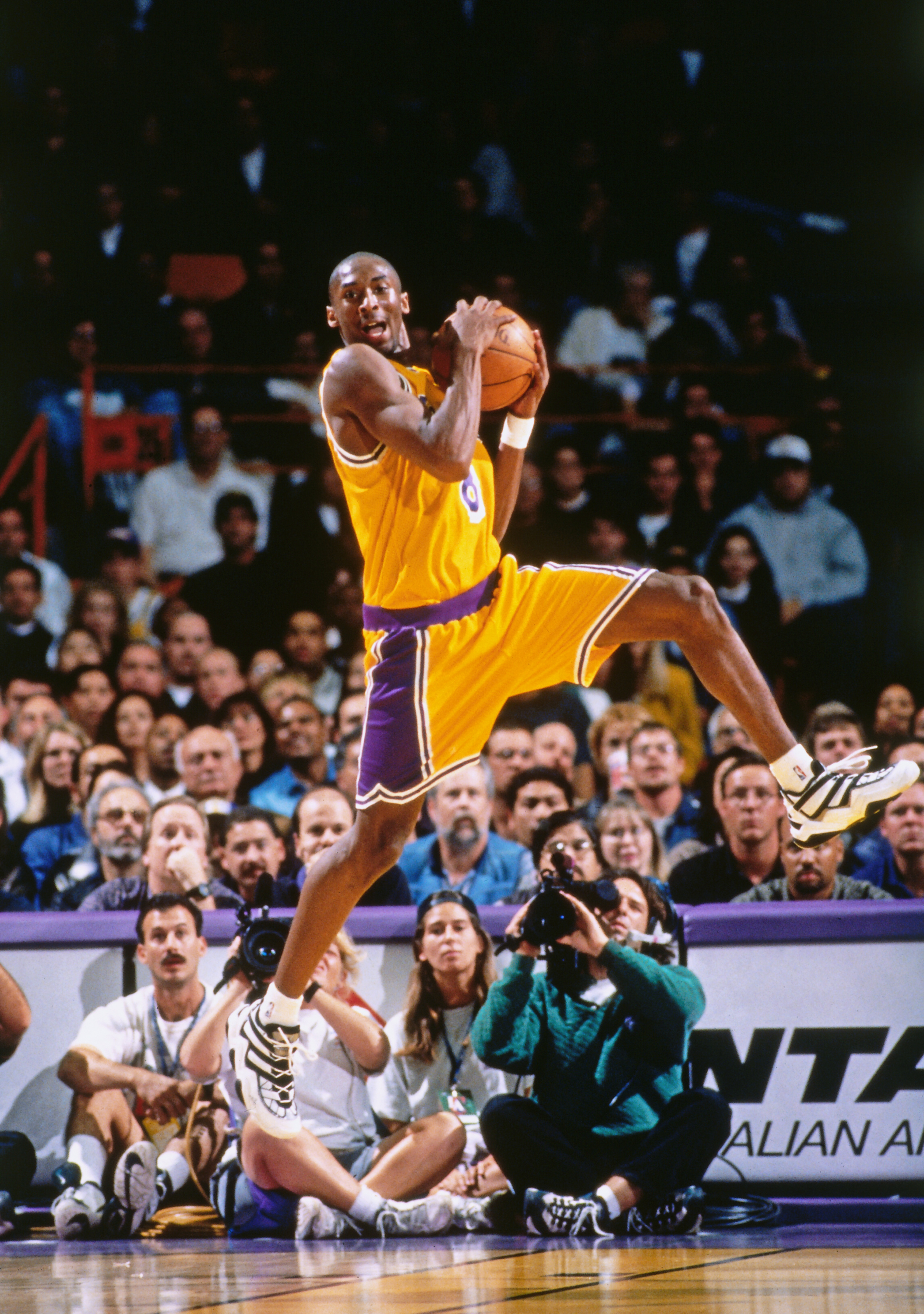INGLEWOOD, CA - NOVEMBER 3: Kobe Bryant #8 of the Los Angeles Lakers rebounds against the Minnesota Timberwolves in his first regular season game on November 3, 1996 at The Forum in Inglewood, California. NOTE TO USER: User expressly acknowledges and agrees that, by downloading and/or using this Photograph, user is consenting to the terms and conditions of the Getty Images License Agreement. Mandatory Copyright Notice: Copyright 1996 NBAE (Photo by Andrew D. Bernstein/NBAE via Getty Images)