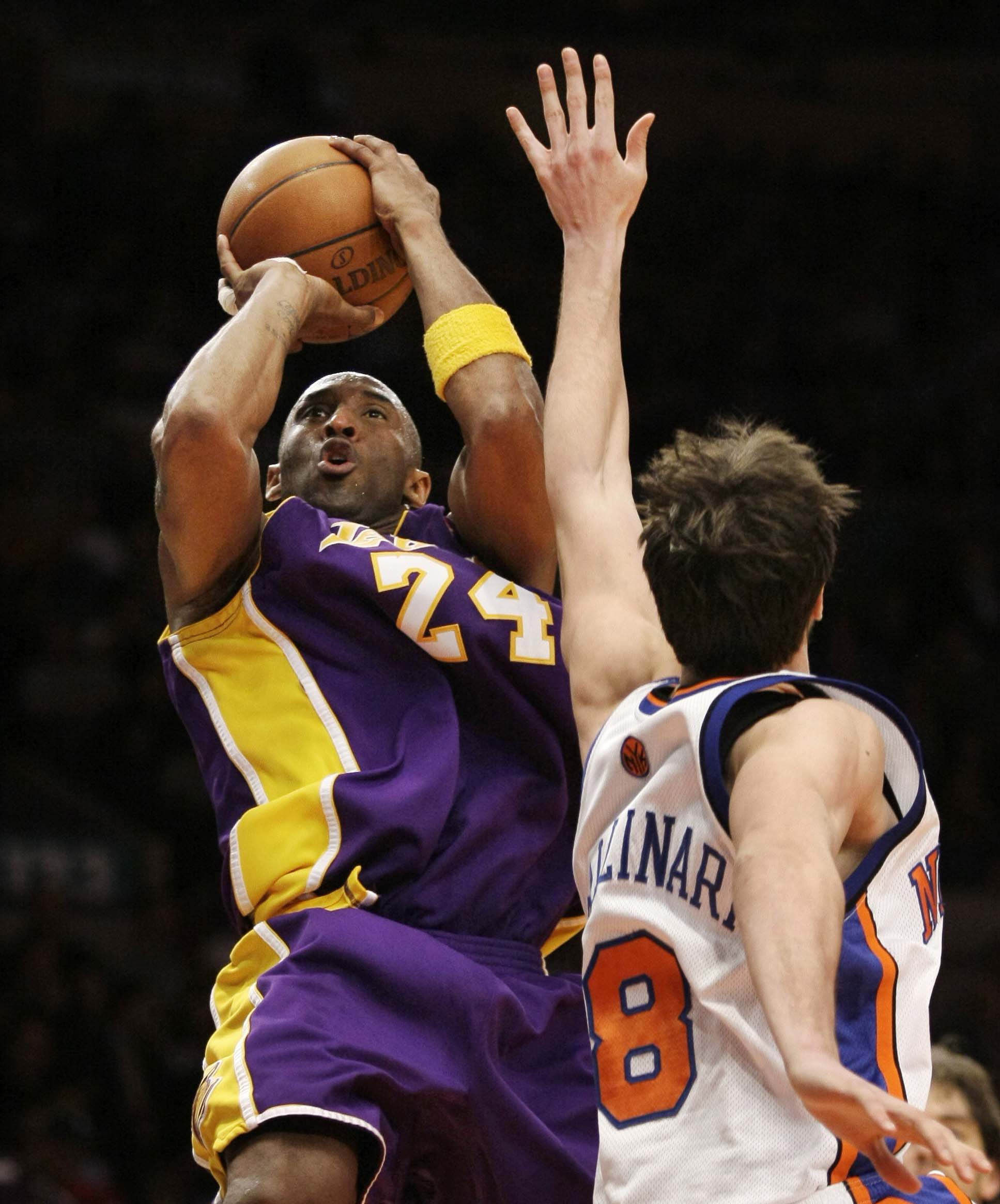 Los Angeles Lakers guard Kobe Bryant (24) shoots over New York Knicks forward Danilo Gallinari (8) in the fourth quarter of an NBA basketball game at Madison Square Garden in New York, Monday, Feb. 2, 2009. Bryant had 61 points in the game as the Lakers won 126-117. (AP Photo/Kathy Willens)