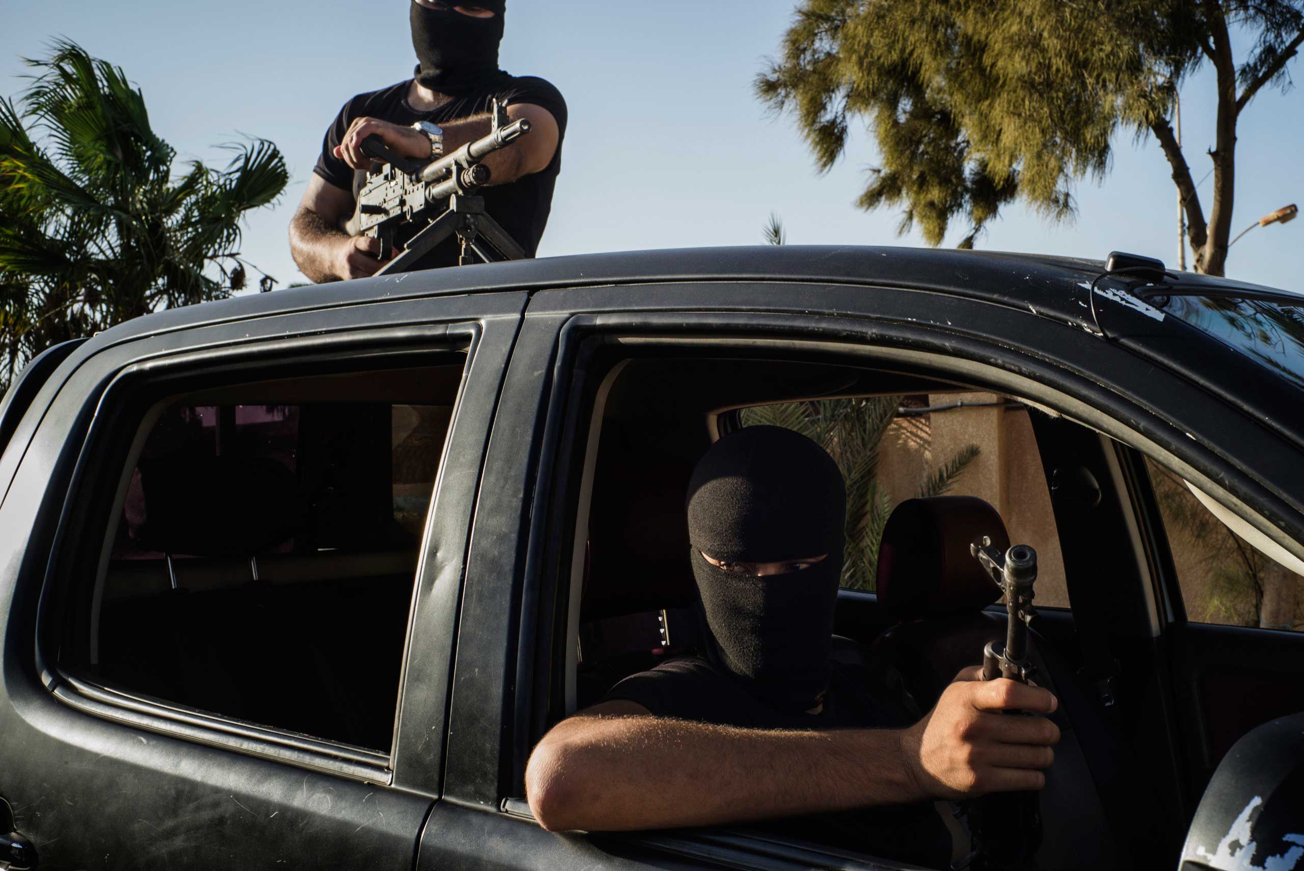 The Washington Post: A Libyan Militia Confronts the World’s Migrant Crisis Members of the Black Masks, a militia that is trying to shut down the local smuggling business, drive through Zuwarah.