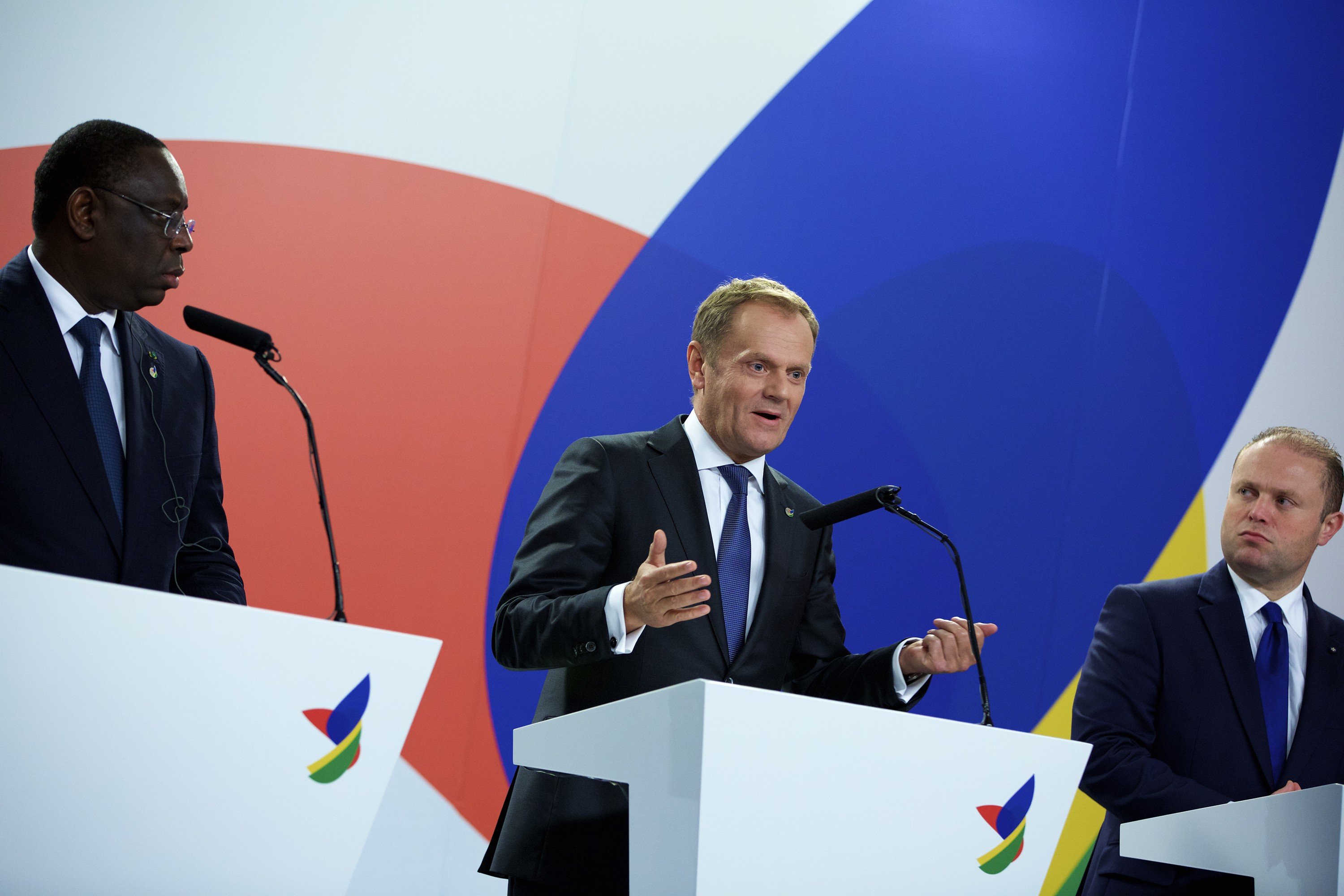President of the European Council Donald Tusk speaks at the press conference with Prime Minister of Malta Joseph Muscat (L) and President of Senegal Macky Sall (R) following a two-day summit on migration that ended in Valletta, Malta, on Nov. 12, 2015. (Jin Yu—Xinhua Press/Corbis)