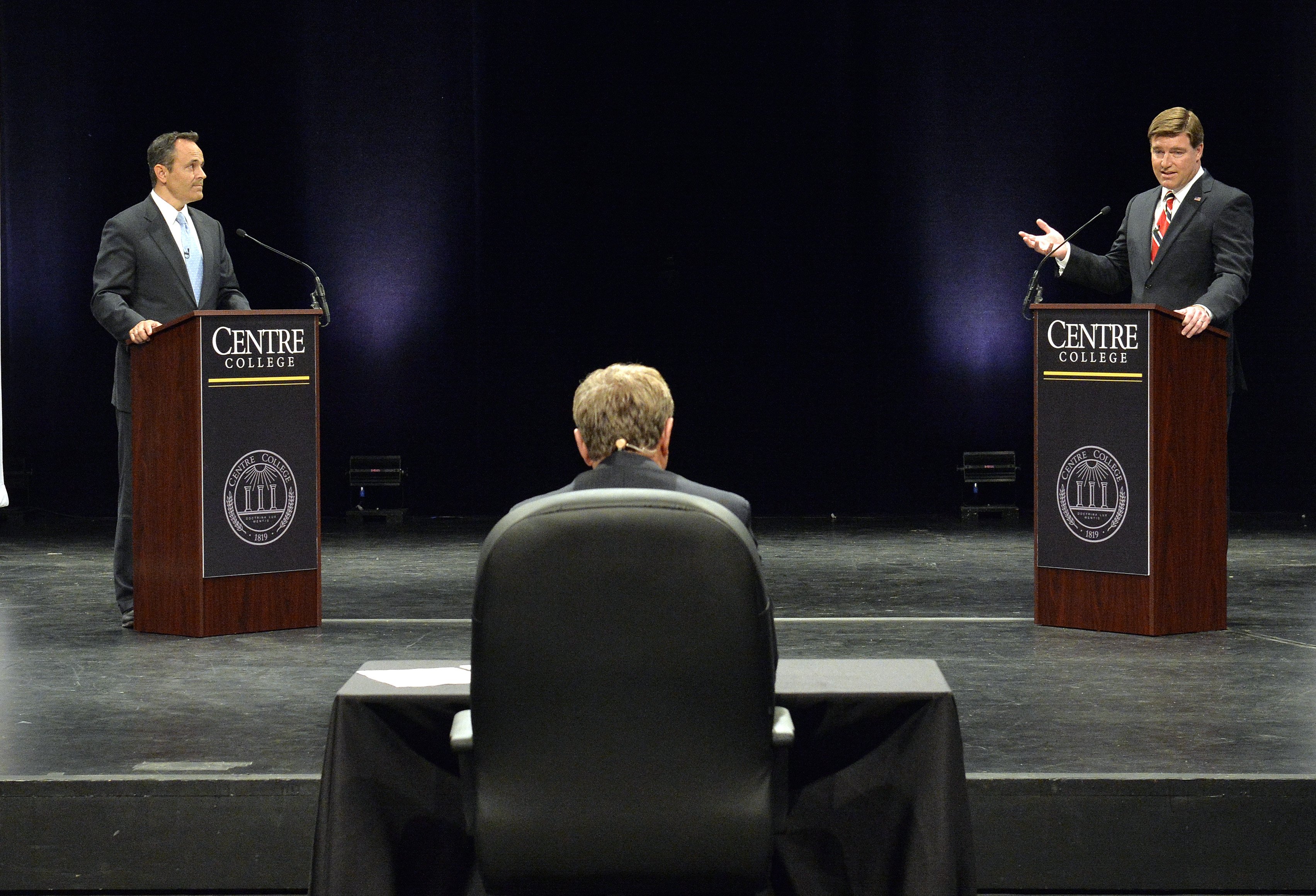 Kentucky Democratic gubernatorial candidate Jack Conway, right, responds to a question from the moderator, as his opponent, Republican Matt Bevin Looks on during the 2015 Kentucky Gubernatorial Debate hosted by Centre College on Oct. 6, 2015, in Danville, Ky.