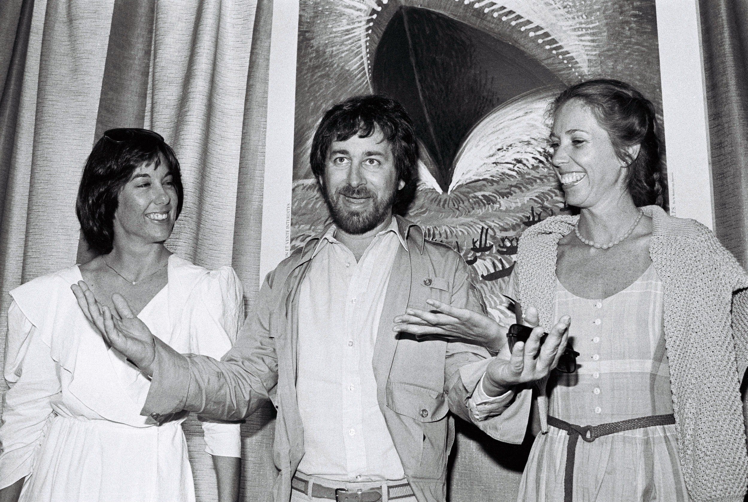 Director Steven Spielberg (C) poses with producer Kathleen Kennedy (L) and screenwriter Melissa Mathison (R) at the 35th Cannes Film Festival, during a photocall for his film 'E.T. the Extra-Terrestrial' in 1982. (Ralph Gatti—AFP/Getty Images)