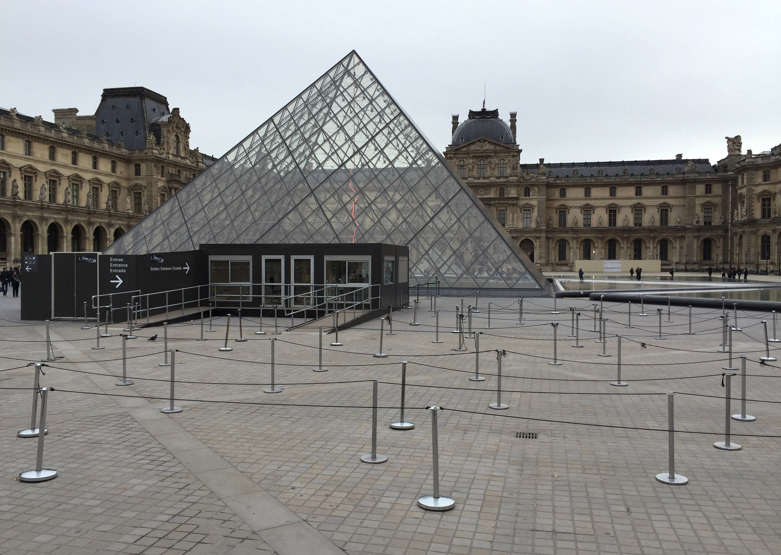 The entrance of the Louvre is seen deserted after the museum was closed following a series of deadly attacks in Paris, on Nov. 14, 2015. (Reinhard Krause—Reuters)