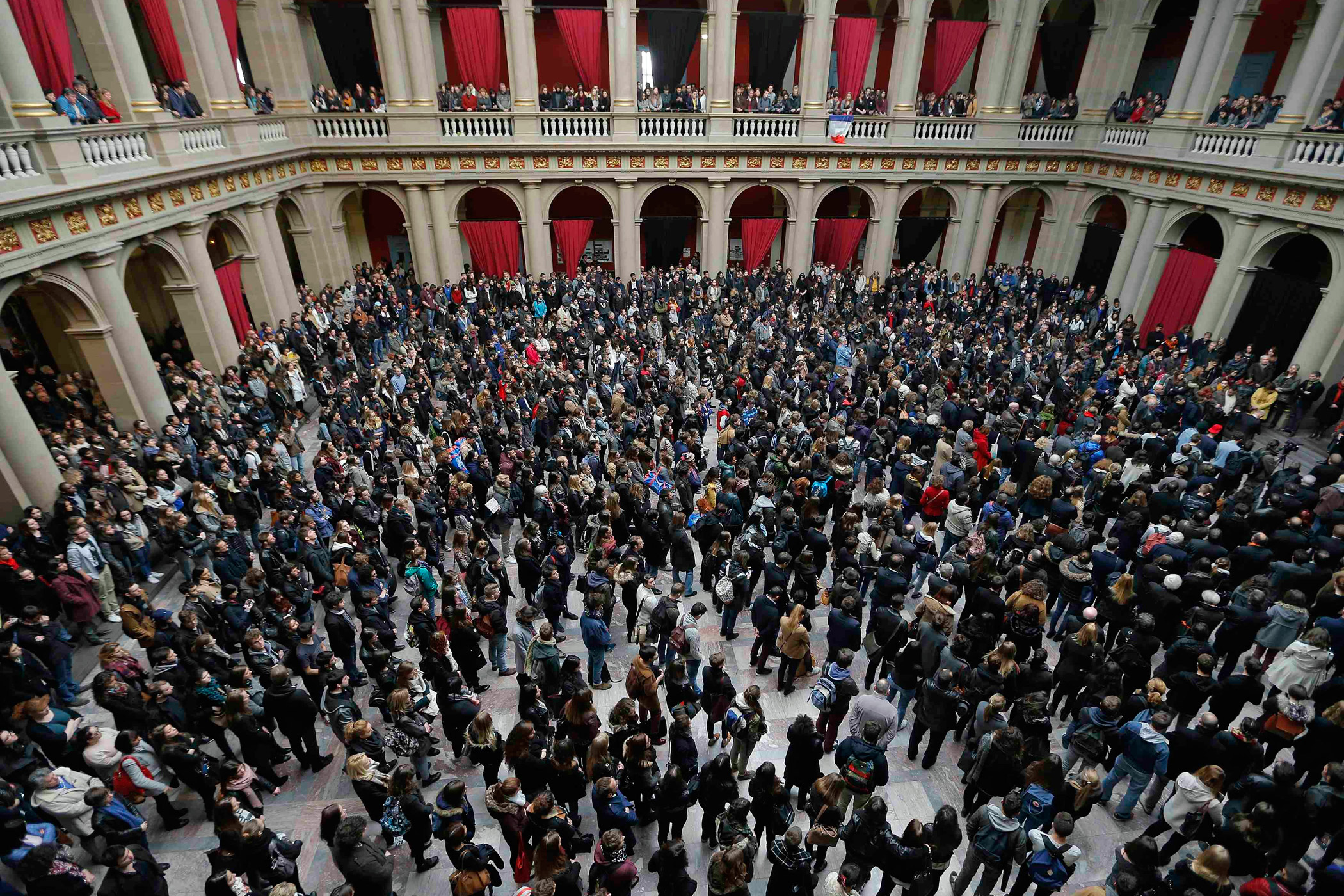 Students and teachers of Strasbourg University observe a minute of silence at the "Palais Universitaire" in Strasbourg, to pay tribute to victims of Friday's attacks on Paris.
