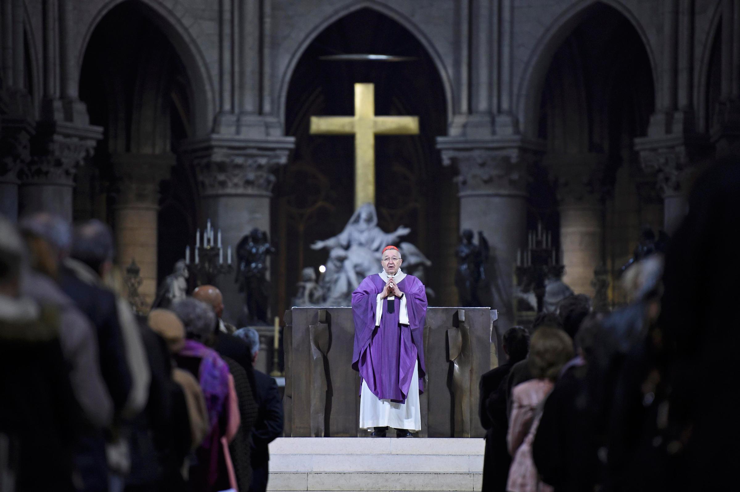 The Archbishop of Paris, Andre Vingt-Trois says mass at the Notre Dame Cathedral in Paris