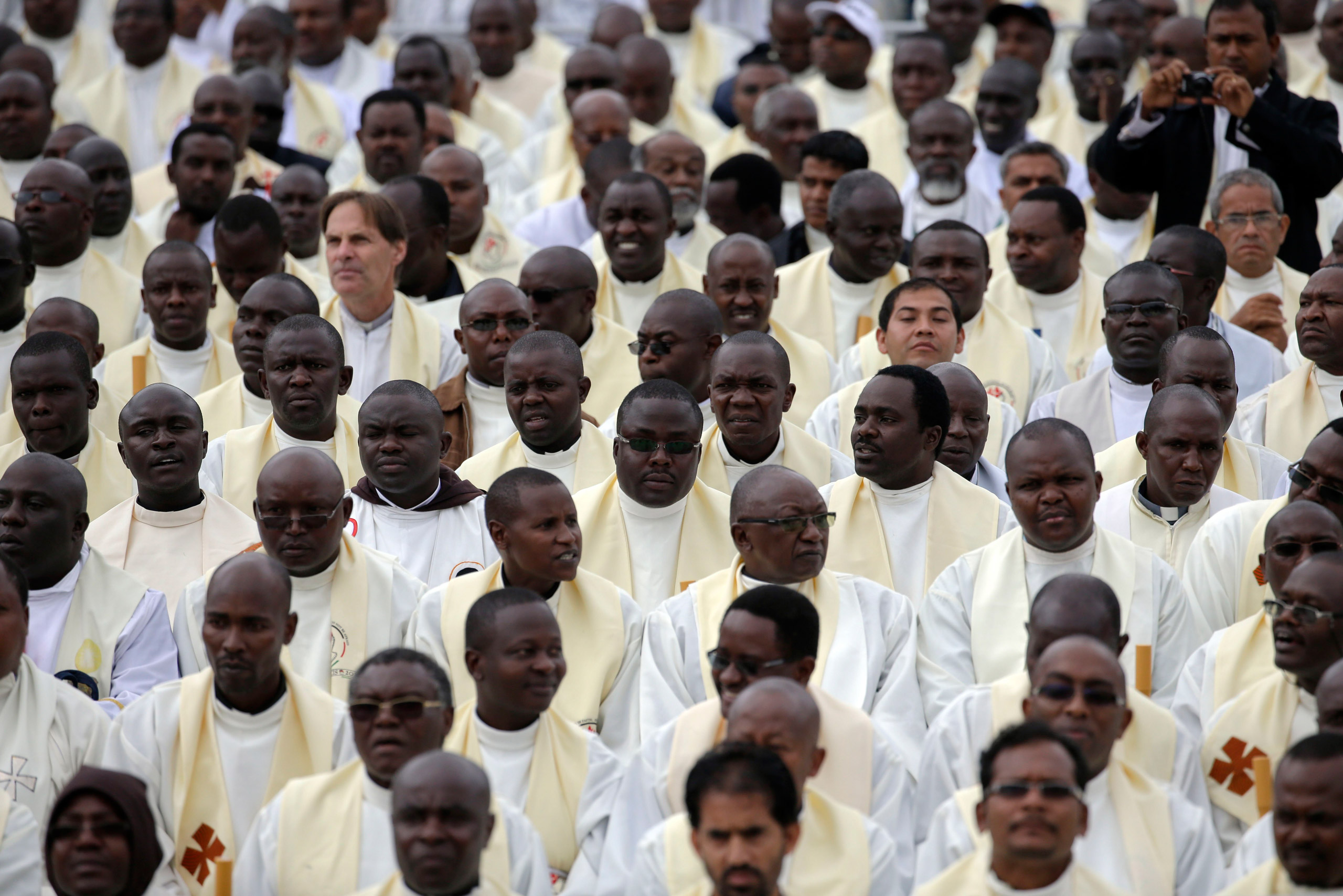 Priests attend a Mass celebrated by Pope Francis on the campus of the University of Nairobi on Nov. 26, 2015.