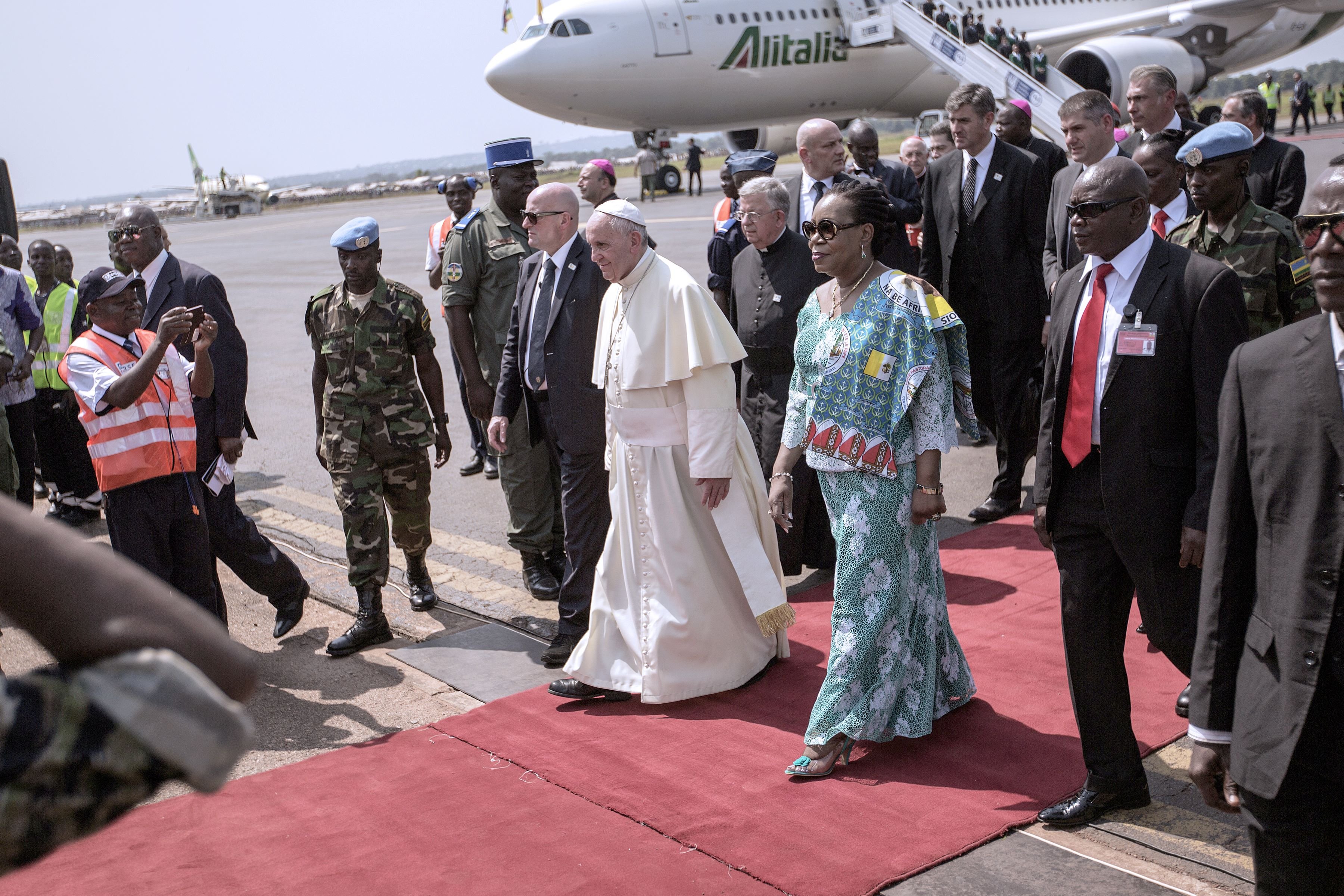 Central African Republic interim president Catherine Samba-Panza welcomes Pope Francis upon his arrival in Bangui, Central African Republic on Nov. 29, 2015.