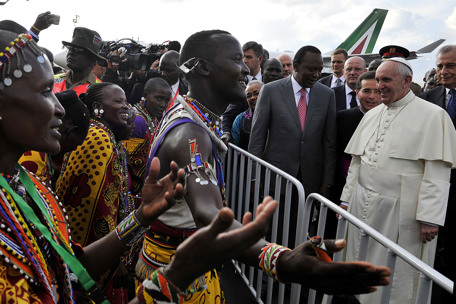 Pope Francis watches traditional dancers after he arrived at the Jommo Kenyatta International airport in Nairobi on Nov. 25, 2015.