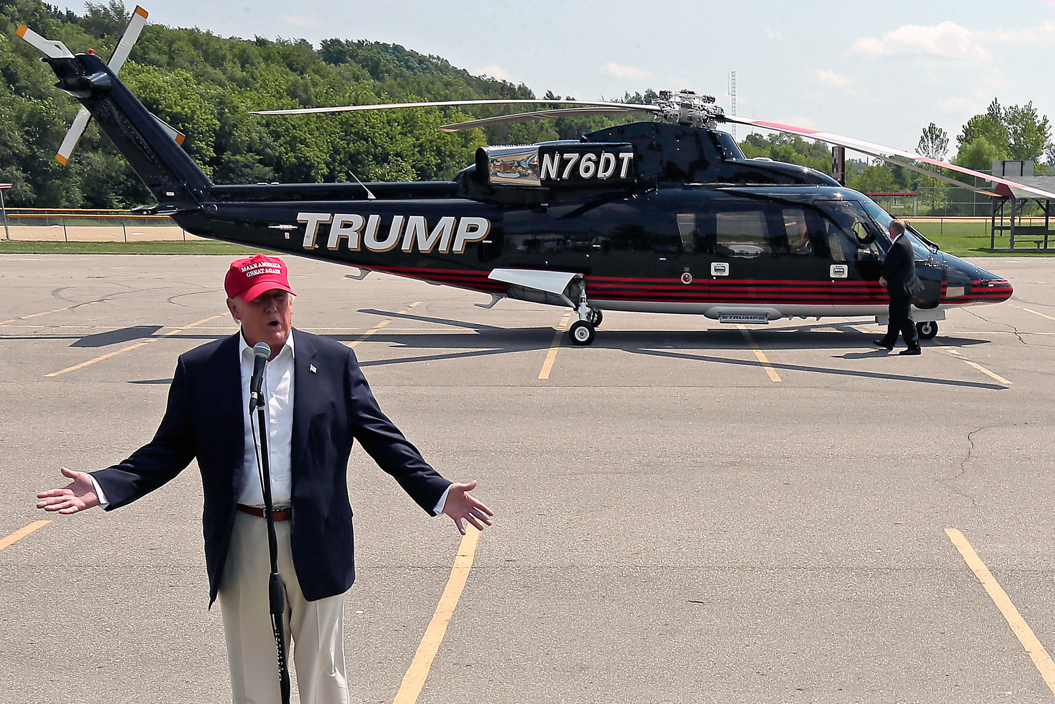 Republican presidential candidate Donald Trump speaks near his helicopter at the Iowa State Fair on Aug. 15, 2015, in Des Moines.