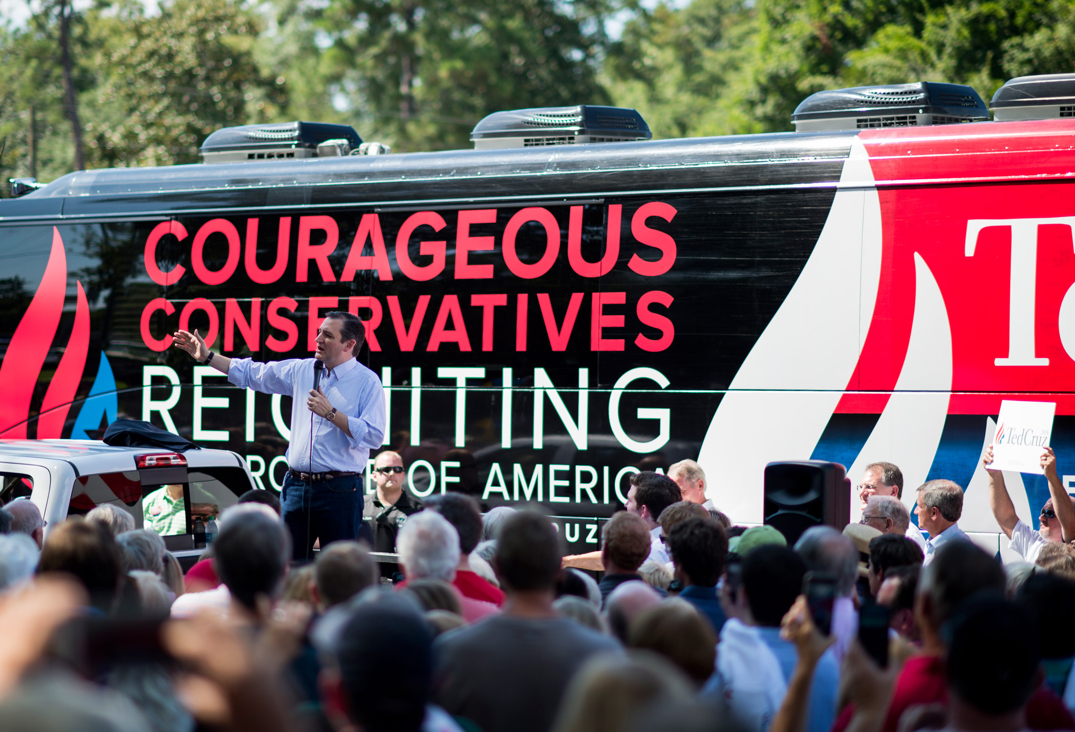 Republican presidential candidate Sen. Ted Cruz speaks to supporters in front of his campaign bus in Newnan, Ga., on Aug. 8, 2015.