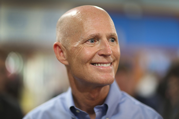 Florida Governor Rick Scott as he visits the Marian Center which offers services for people with intellectual disabilities on July 13, 2015 in Miami Gardens, Florida.
