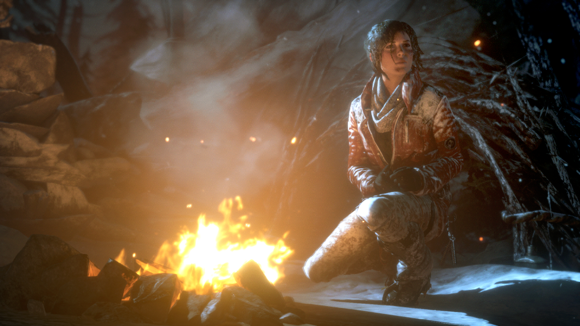 Lara warms herself in front of a campfire as she looks outward into the cold, Siberian night.