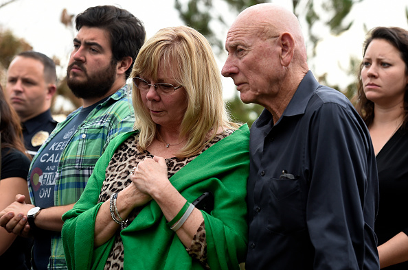 Sandy Phillips, left, and her husband Lonnie, parents of Aurora shooting victim Jessica Ghawi, stand with other family members before addressing members of the media about their reactions to the verdict of life in prison for Aurora Theater shooter James Holmes at the Arapahoe County Justice Center in Centennial, Colorado on August 7, 2015.
