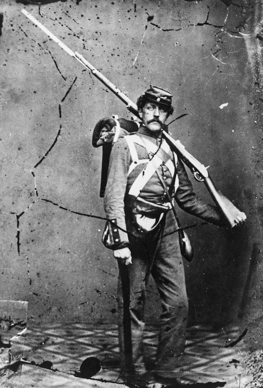 A Union infantryman in uniform, carrying a large rifle and bayonet, during the U.S. Civil War (Hulton Archive / Getty Images)