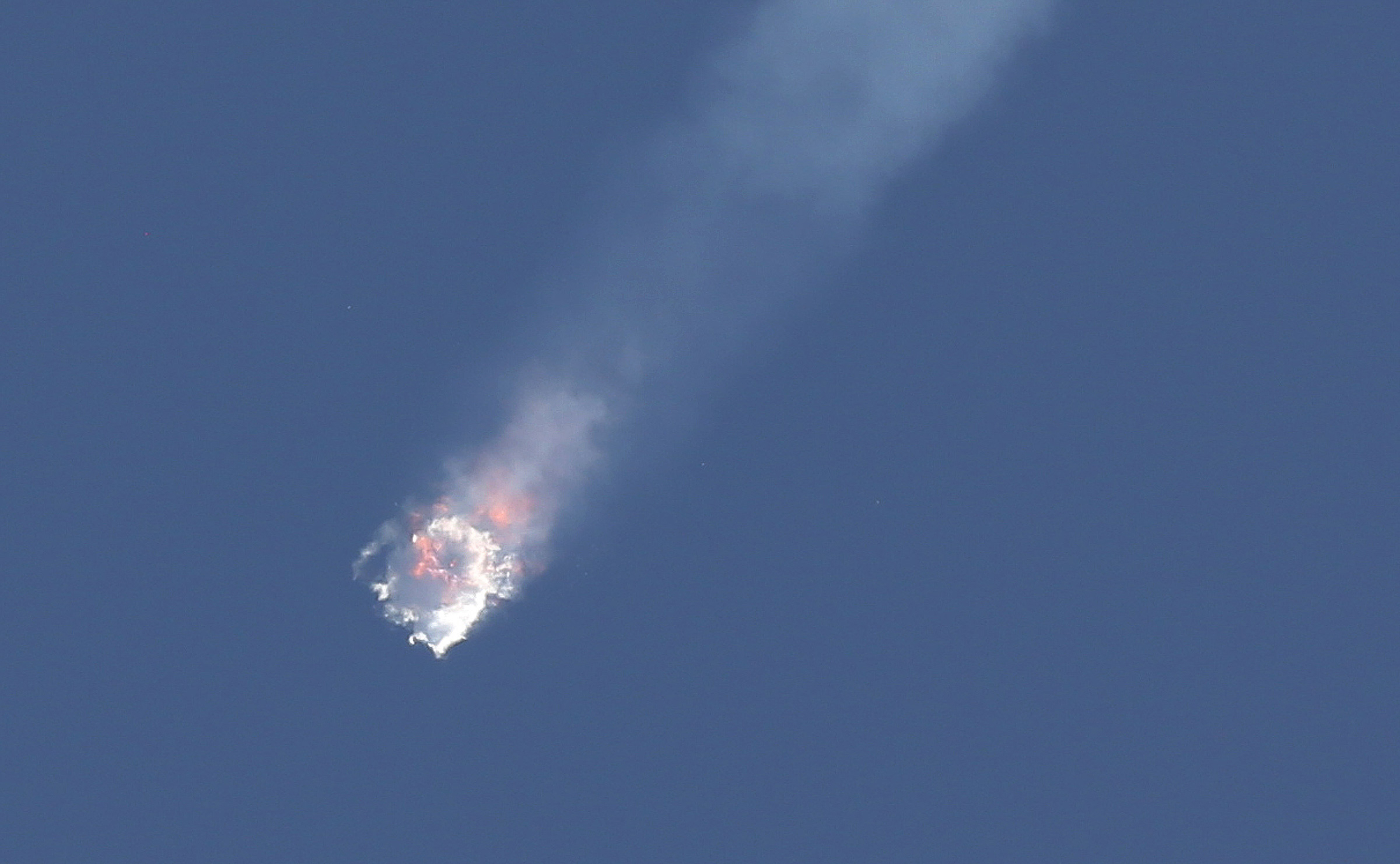 A SpaceX Falcon 9 rocket on its seventh official Commercial Resupply mission to the orbiting International Space Station explodes on June 28, 2015, after launching from Launch Complex 40 at the Cape Canaveral Air Force Station in Florida. (Red Huber—Orlando Sentinel/TNS/Getty Images)