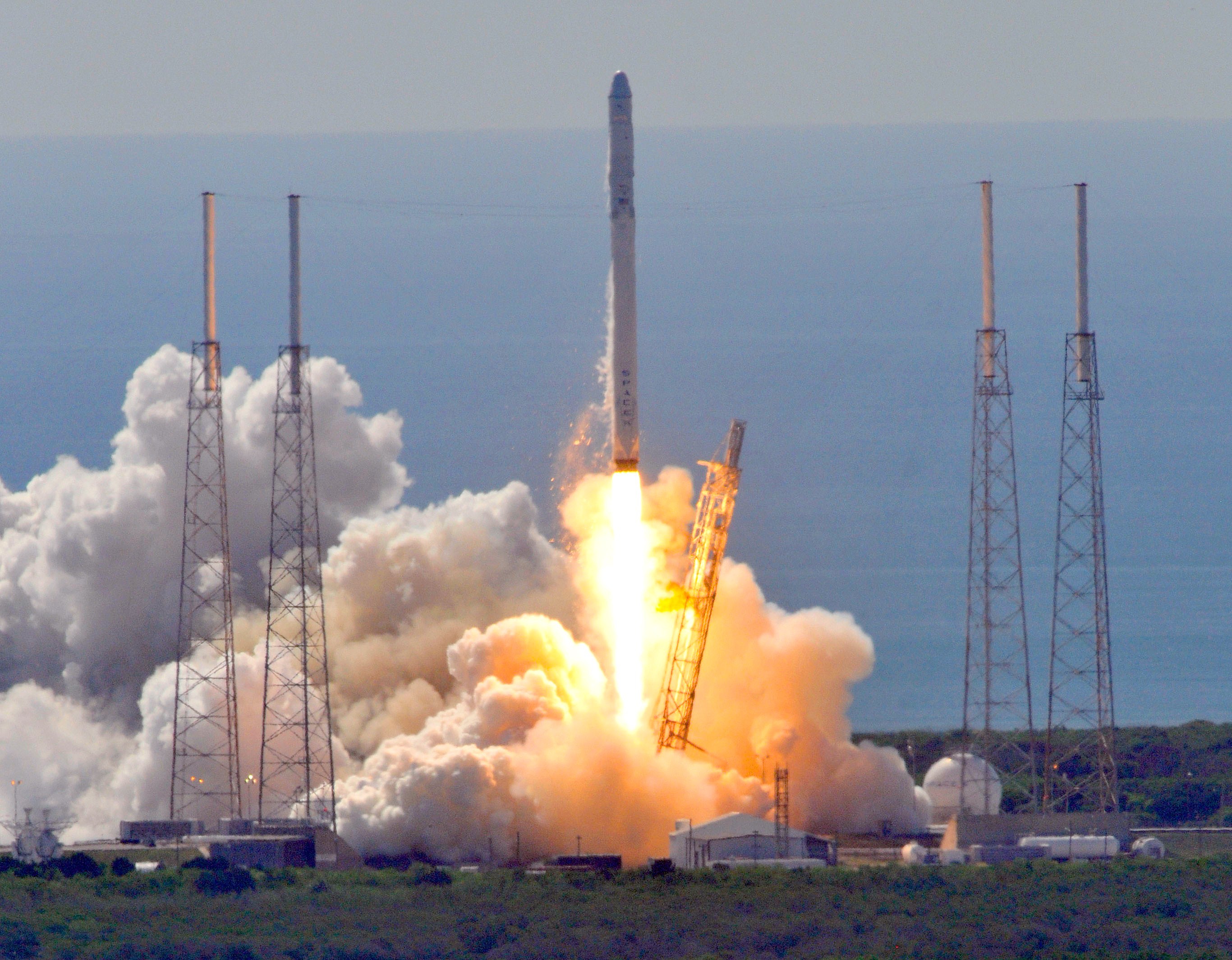 Space X's Falcon 9 rocket as it lifts off from space launch complex 40 at Cape Canaveral, Florida June 28, 2015 with a Dragon CRS7 spacecraft. (BRUCE WEAVER—AFP/Getty Images)
