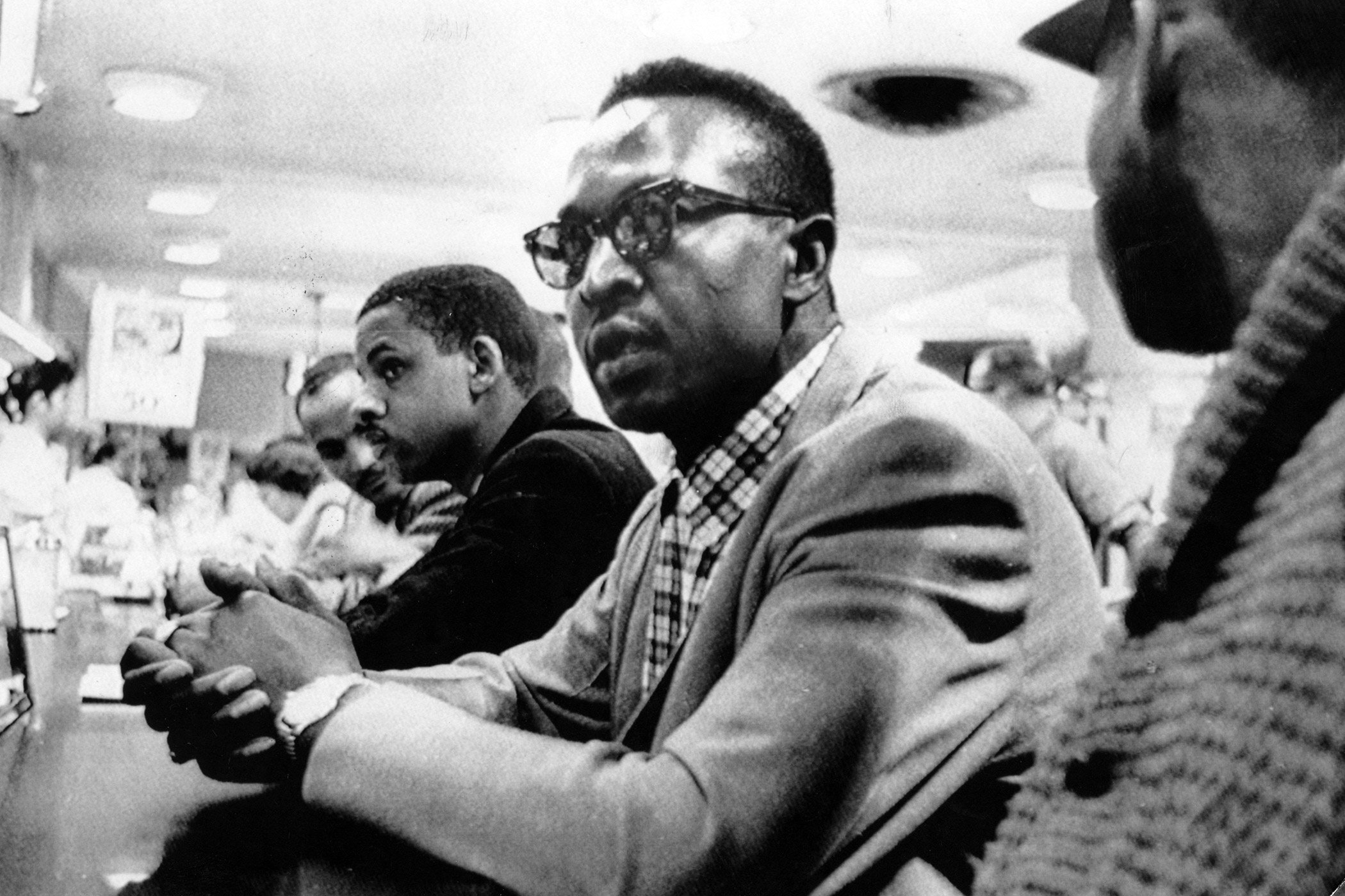 The Greensboro sit-ins, started by four black students from the North Carolina Agricultural and Technical State University, were a peaceful protest of the segregated lunch counter inside the Woolworth store in Greensboro, N.C. in February 1960. The demonstrations, which spread to nearby cities and states, eventually led to the desegregation of the Greensboro Woolworth store.