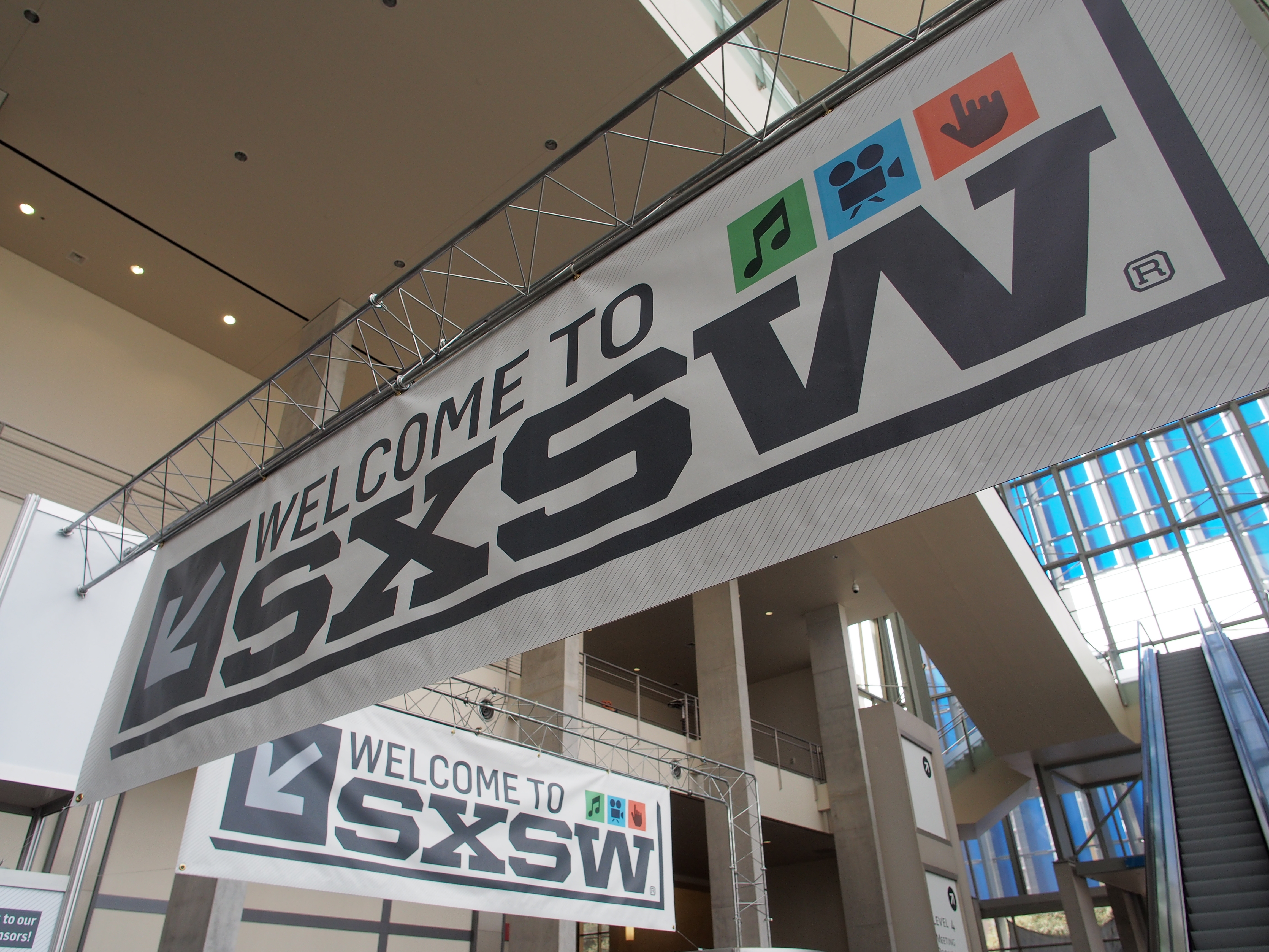 Banners hang in the atrium of the Austin Convention Center on Thursday, March 7, 2012 on the eve of the opening of the 27th South By Southwest (SXSW) interactive, film and music festival. (AFP/Getty Images)