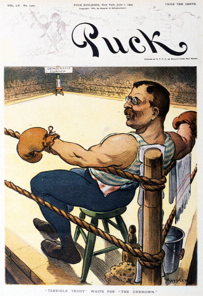 The cartoon image of Teddy Roosevelt as a boxer between rounds is the cover art for Puck magazine issue June 1, 1904 in New York City.