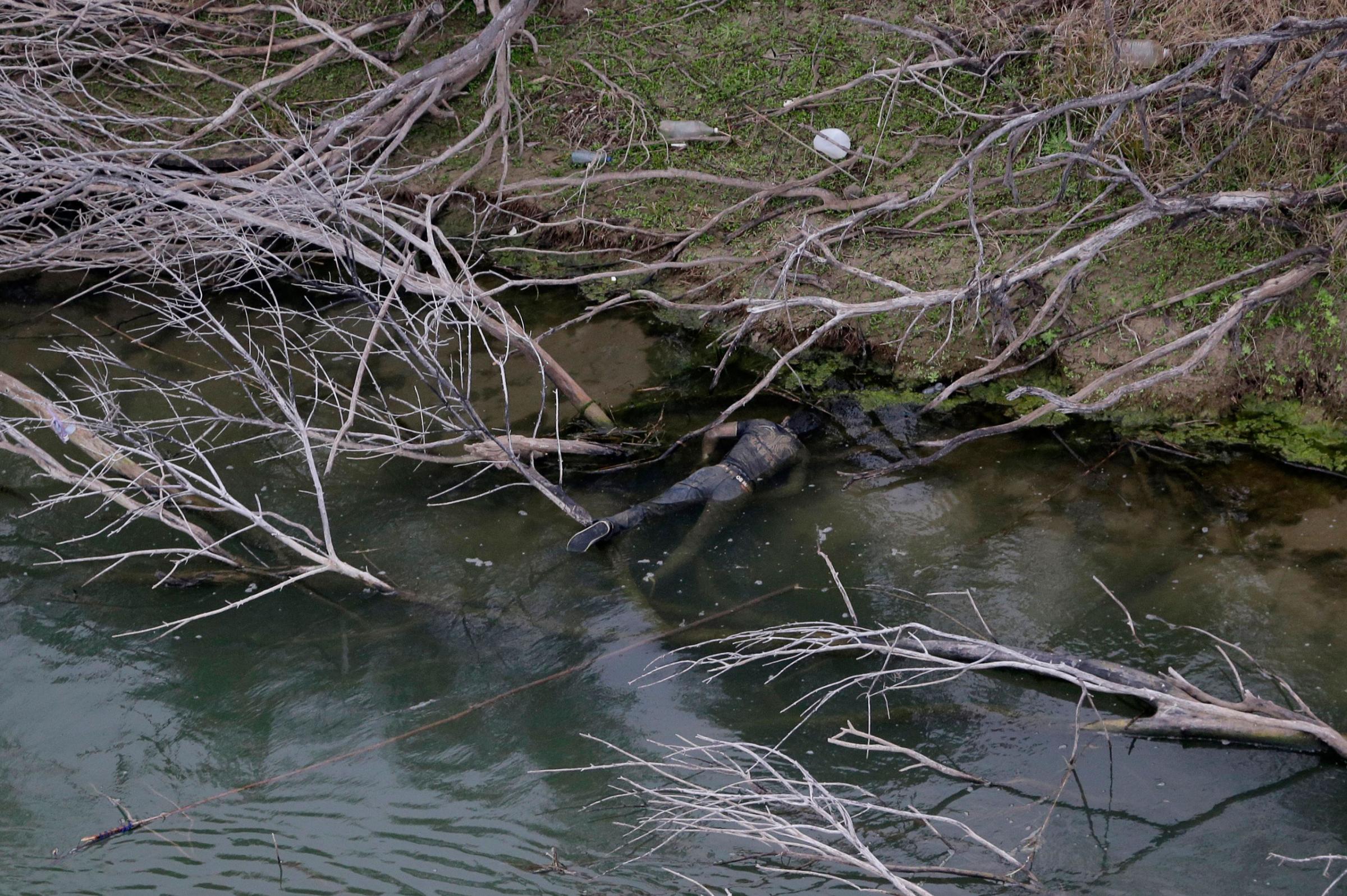 A body discovered by the U.S. Customs and Border Protection Air and Marine while on patrol near the Texas-Mexico border floats in the Rio Grande, in Rio Grande City, Texas.