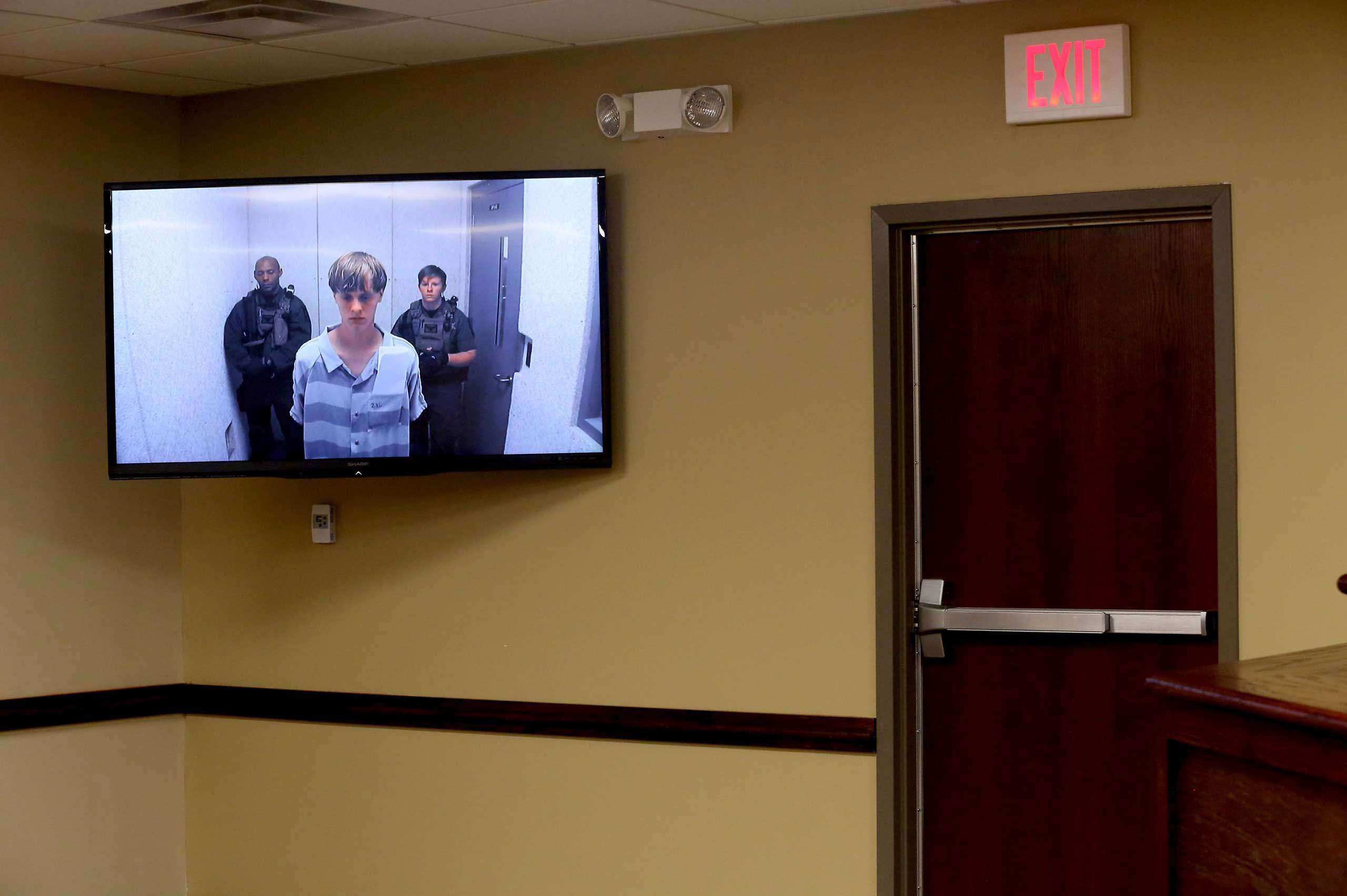 Dylann Roof appears via a jailhouse videolink at the Centralized Bond Hearing Court in North Charleston, S.C. June 19, 2015. Roof was charged with nine counts of murder and firearms charges in the shooting at Emanuel African Methodist Episcopal Church in downtown Charleston, S.C.