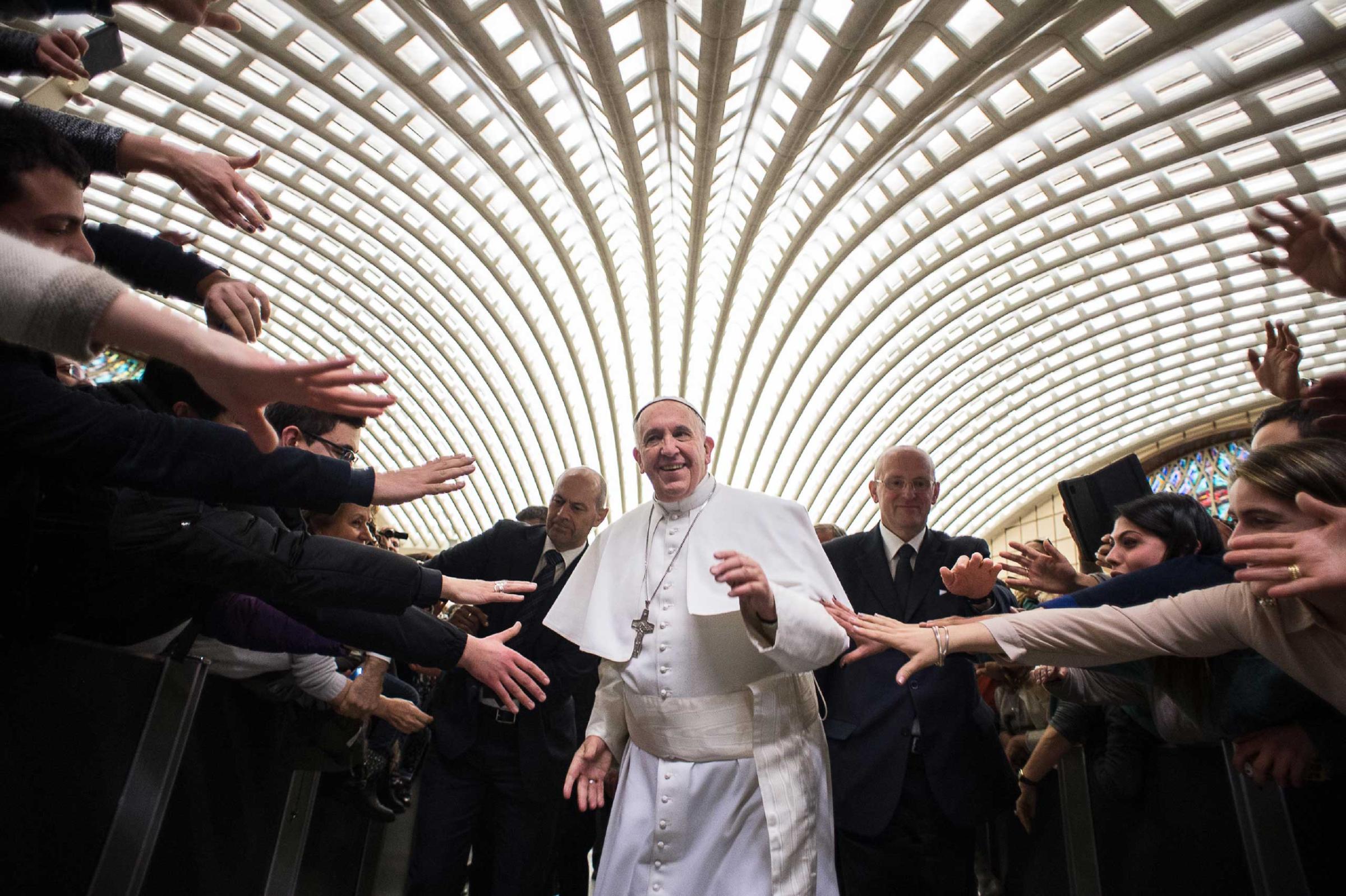Pope Francis arrives for a special audience with members of the dioceses of Cassano allo Ionio, from southern Italy, at the Vatican. Feb. 21, 2015