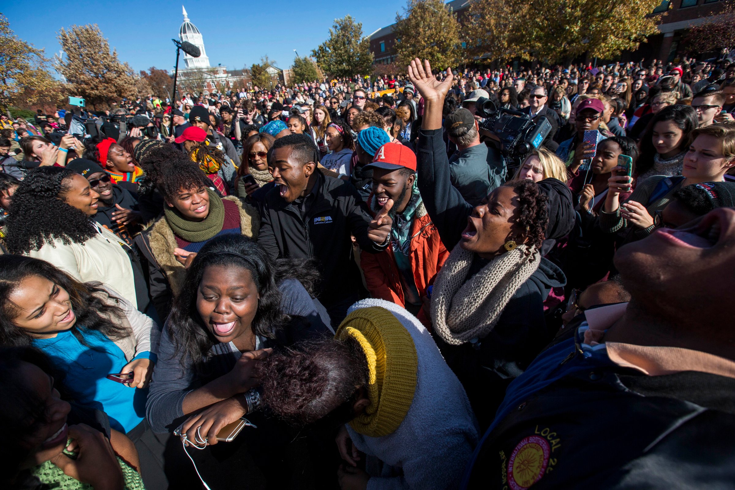 Protesters celebrate after the resignation resignation of Missouri University president Timothy M. Wolfe on the Missouri University Campus in Columbia, MO on Nov. 9, 2015.